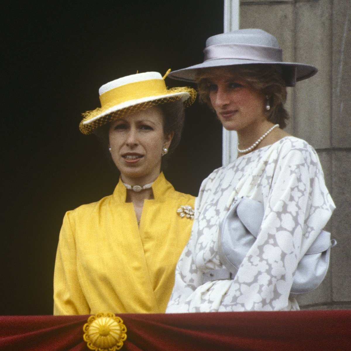 Princess Anne and Princess Diana standing on the balcony of Buckingham Palace during Trooping the Colour