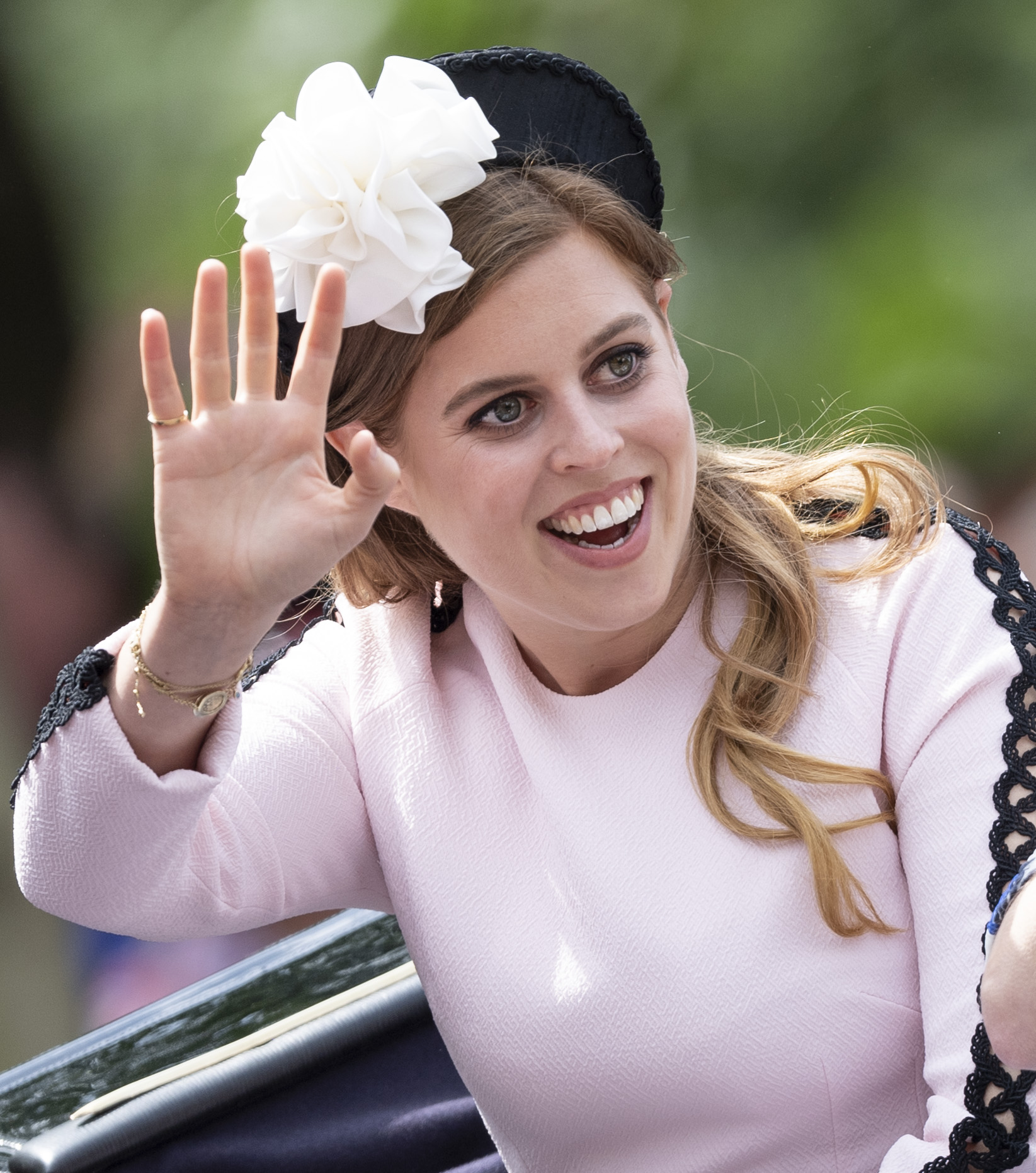 Princess Beatrice waves from carriage during Trooping the Color