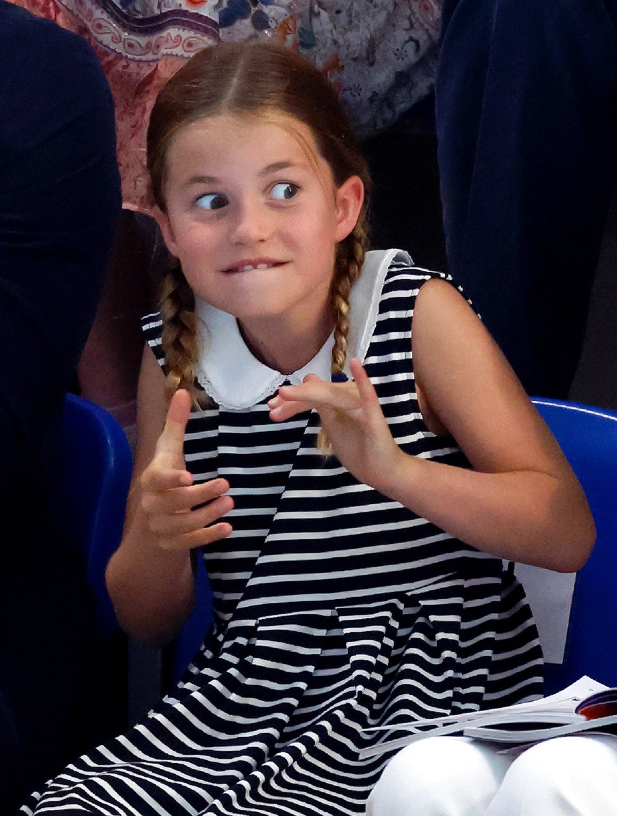 Princess Charlotte clapping during a swimming competition at the Sandwell Aquatics Centre