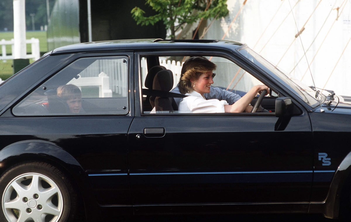 Princess Diana, in her 'very brave choice' of a RS Ford Escort, with Prince William in the backseat