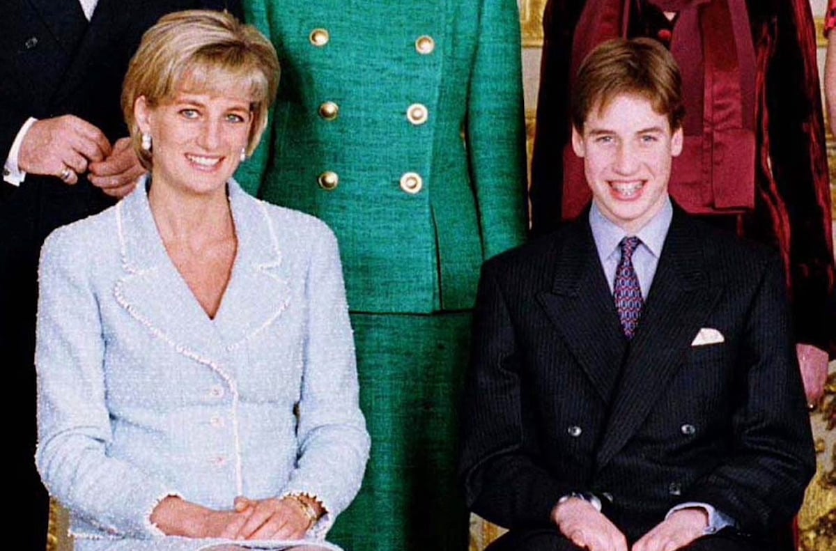Princess Diana and Prince William, who appeared walked down the street in Princess Diana and Prince William's last photos together in August 1997, sit next to each other and smile