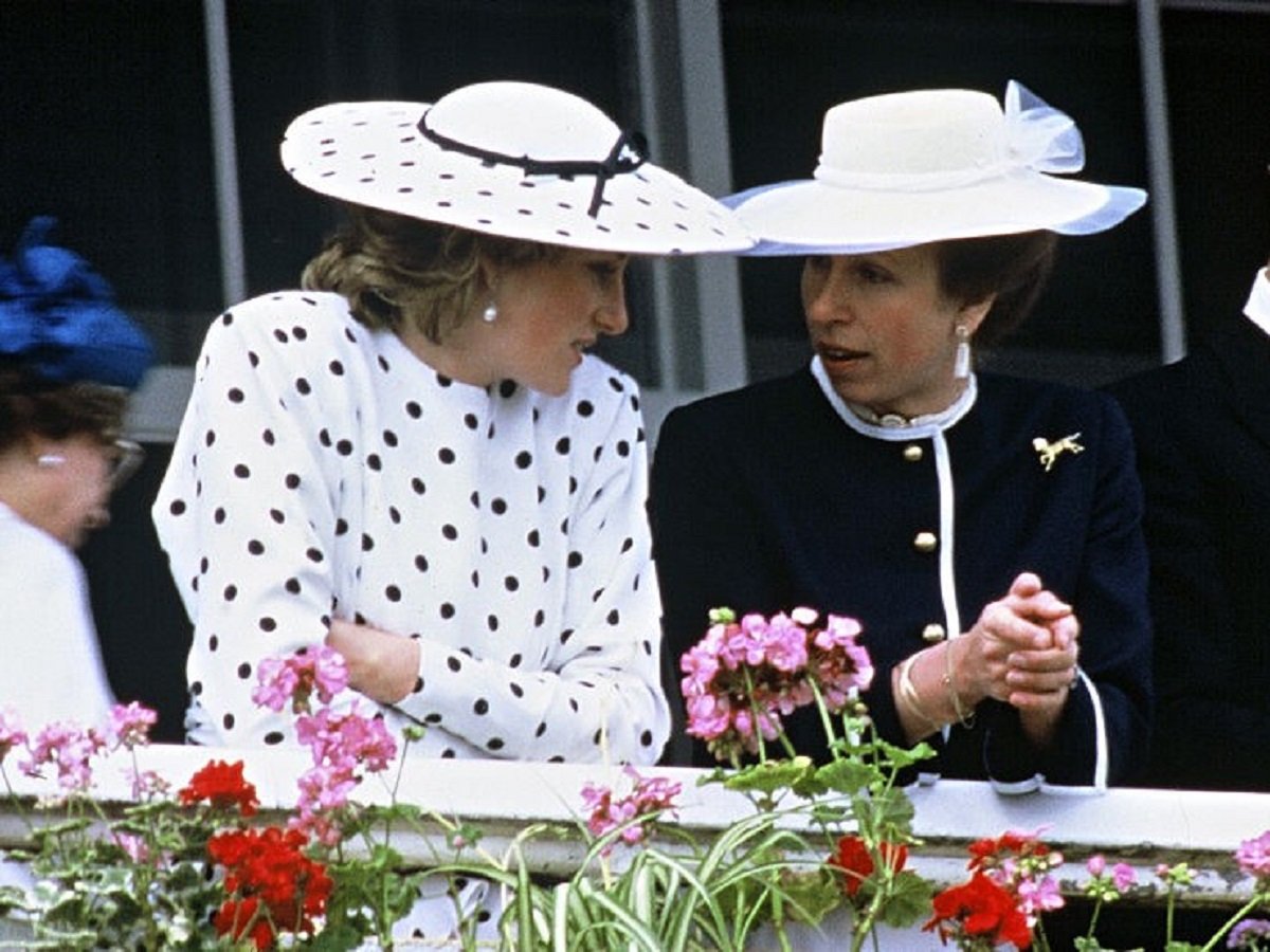 Princess Diana and Princess Anne chatting in the Royal box at the Epsom Derby