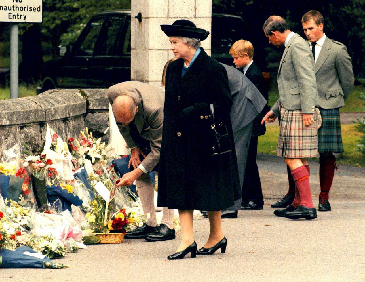 Queen Elizabeth and the royal family visit growing memorial outside Balmoral after Princess Diana's death