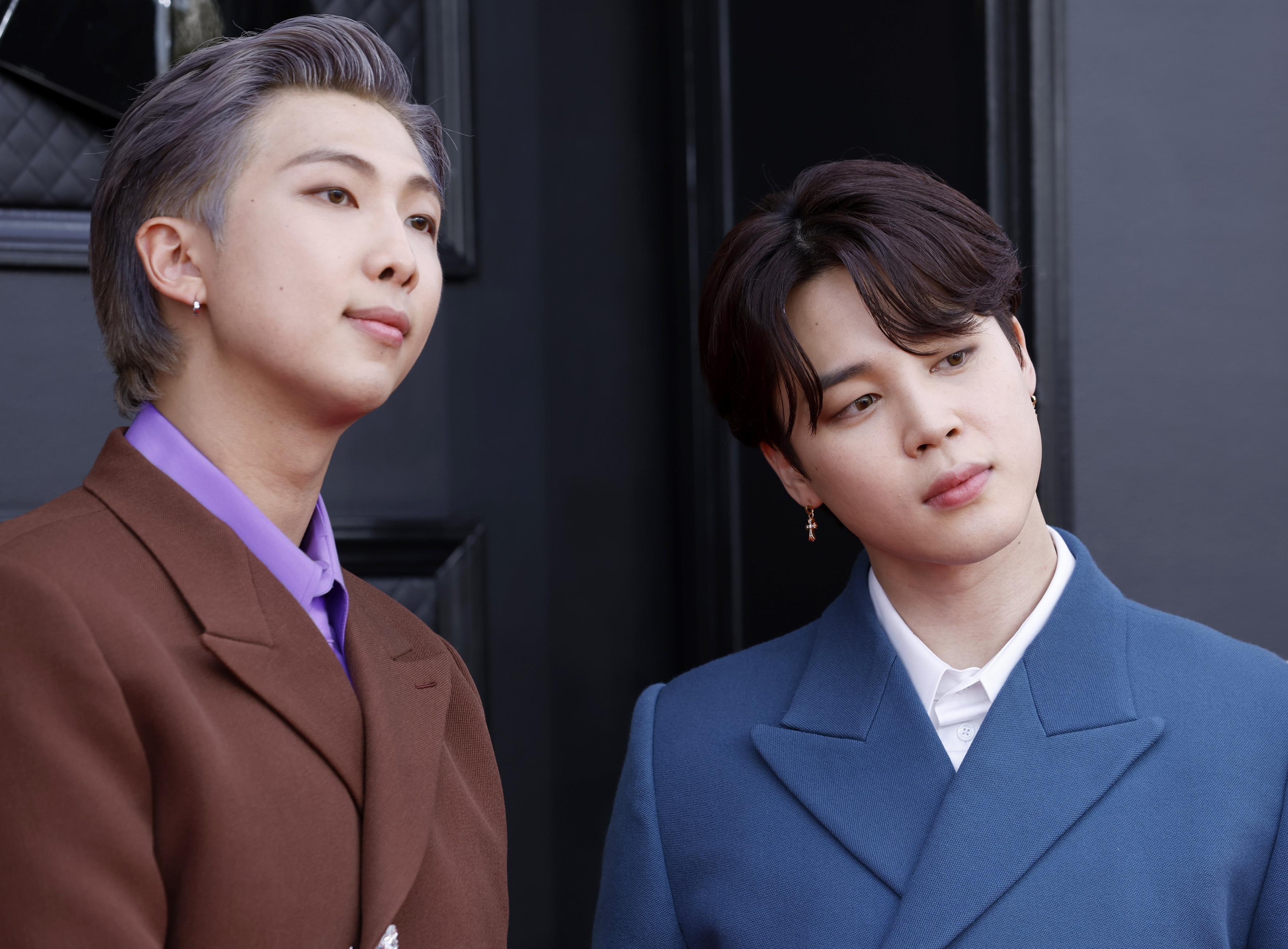 RM and Jimin of BTS attend the 64th Annual GRAMMY Awards