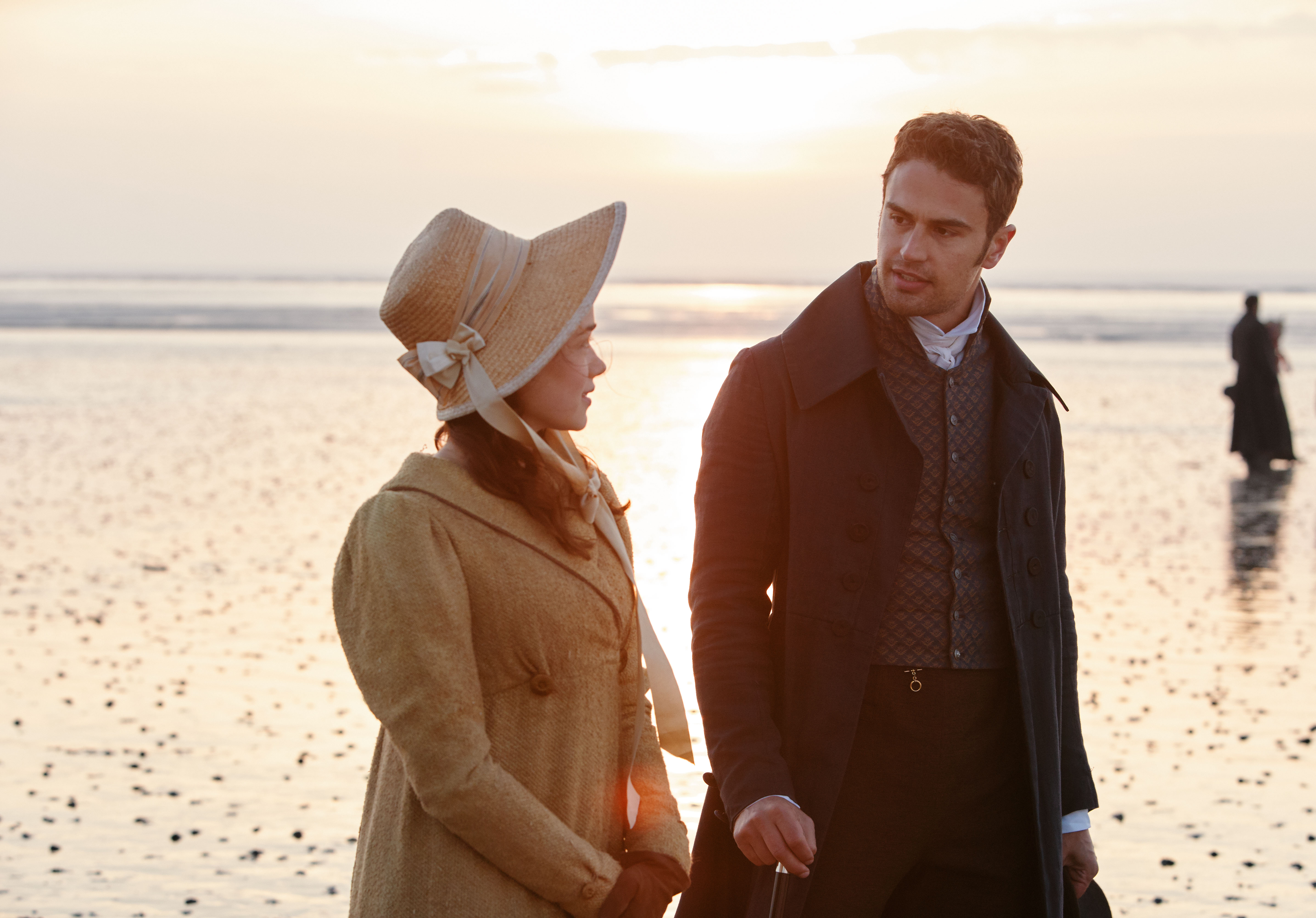 Rose Willams as Charlotte, wearing a bonnet, talking to Sidney (Theo James) in 'Sanditon' Season 1