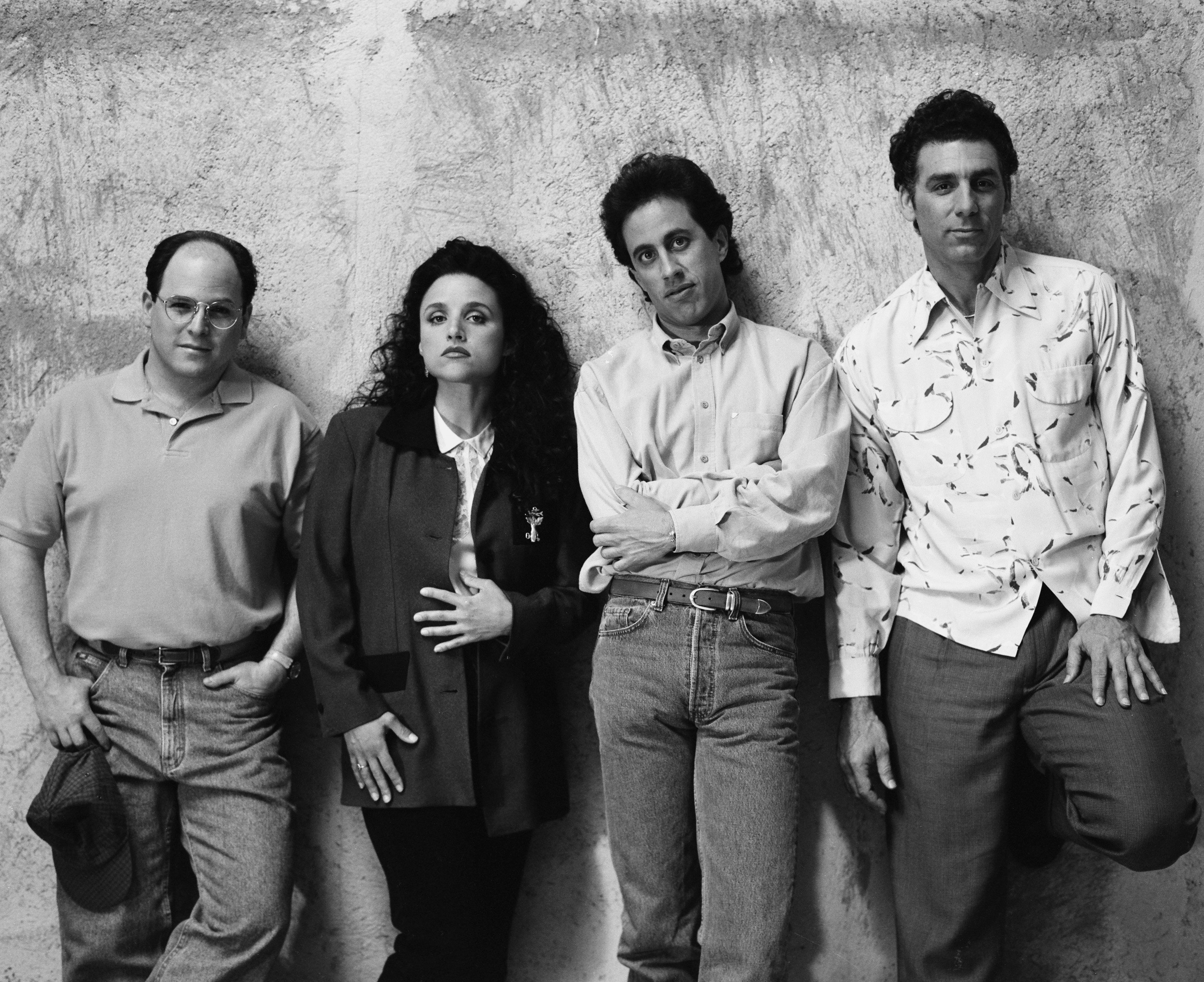 Jason Alexander as George Costanza, Julia Louis-Dreyfus as Elaine Benes, Jerry Seinfeld as Jerry Seinfeld and Michael Richards as Cosmo Kramer in a promotional photo for 'Seinfeld'
