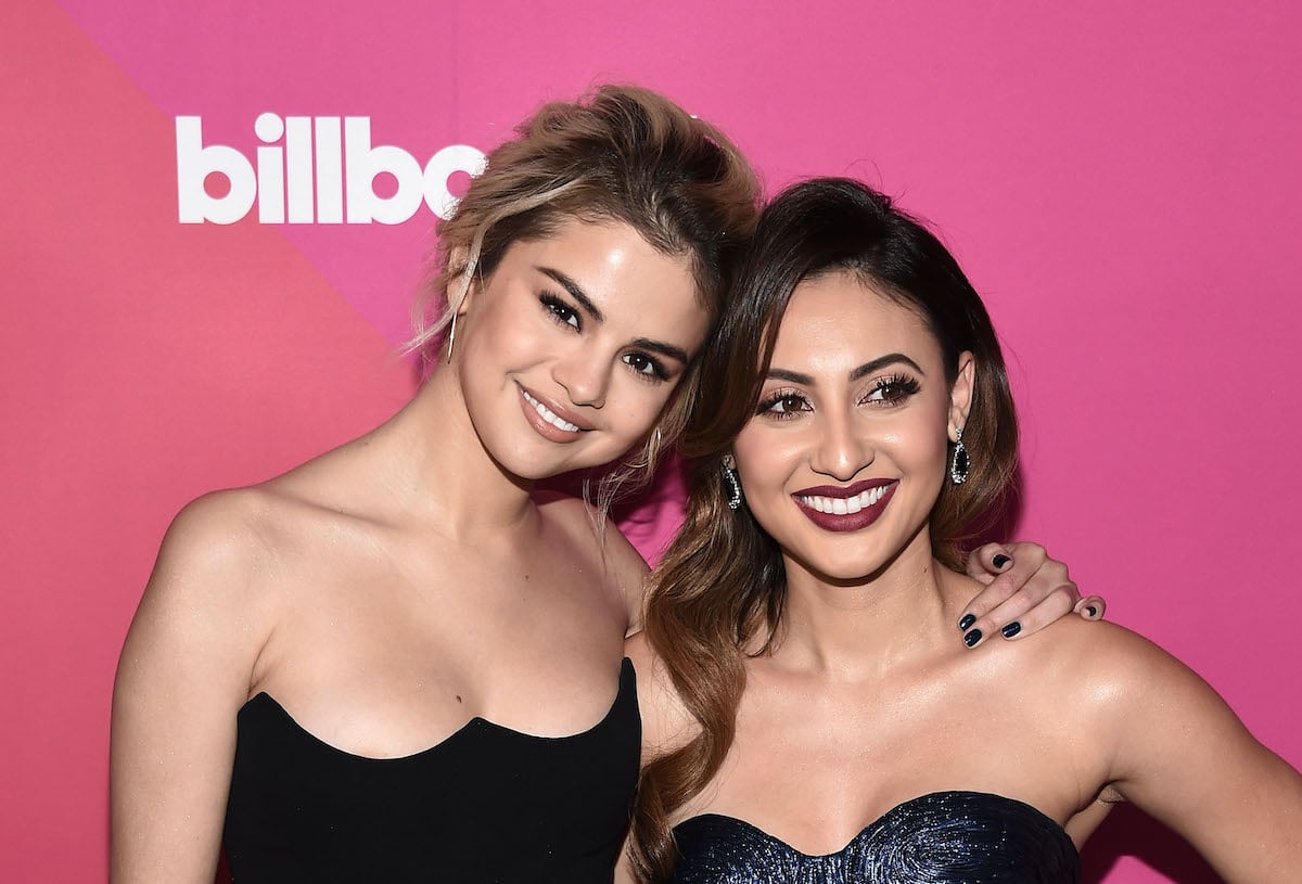 Selena Gomez and Francia Raisa hug on the red carpet