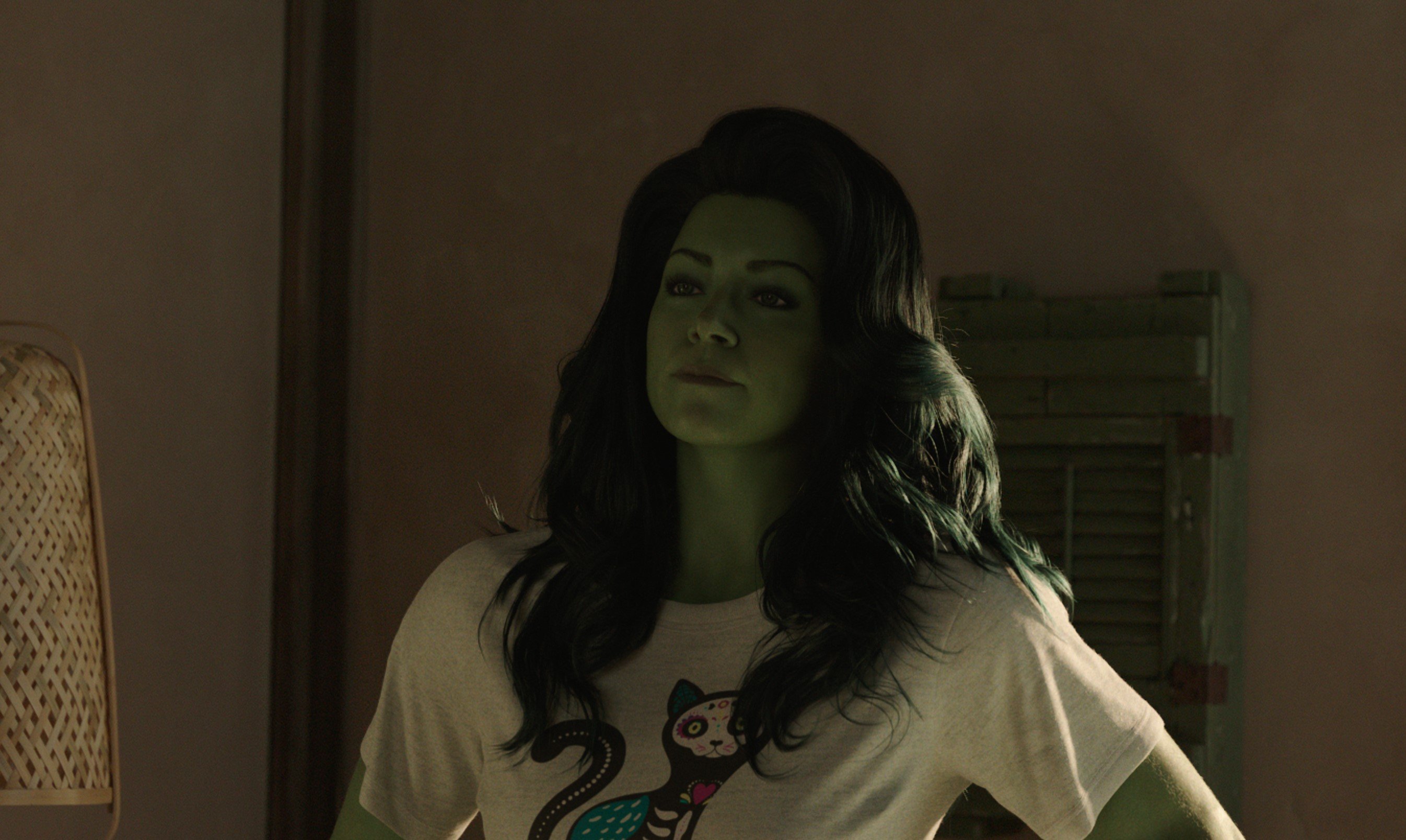 Tatiana Maslany in 'She-Hulk: Attorney at Law,' which has a release date of Aug. 18. She's green, her hair is down, and she's wearing a white T-shirt.