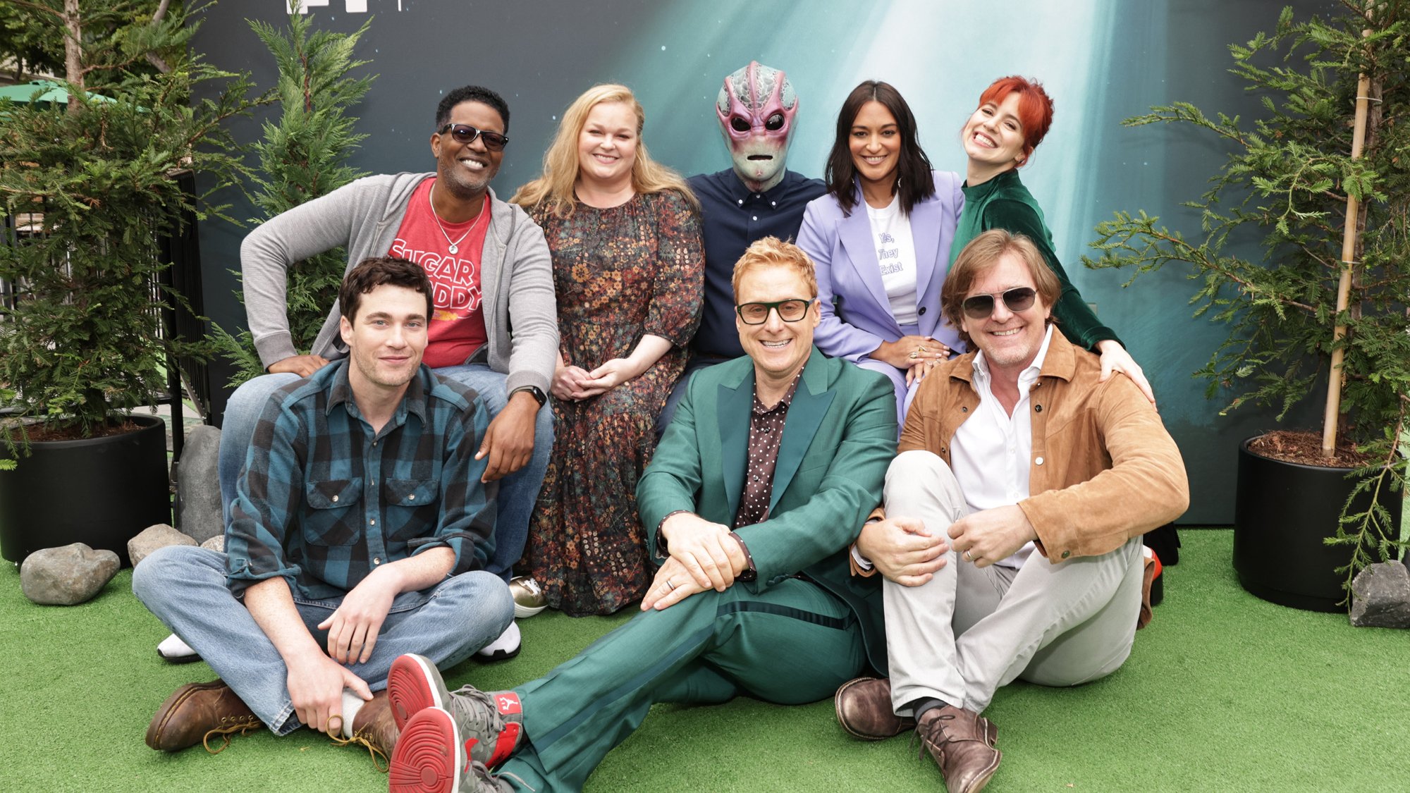 Showrunner Chris Sheridan and the main cast of 'Resident Alien.'