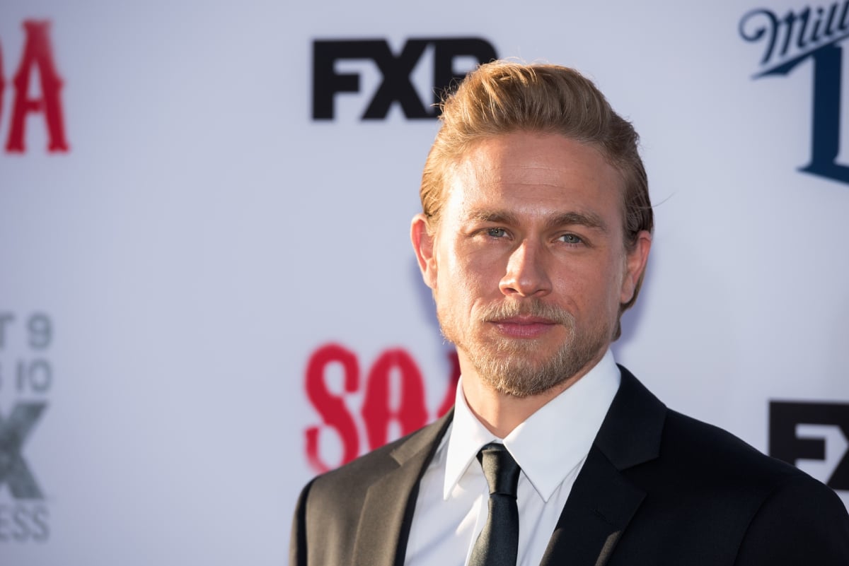 Charlie Hunnam plays Jax Teller in Sons of Anarchy. Jax wears a suit and tie.