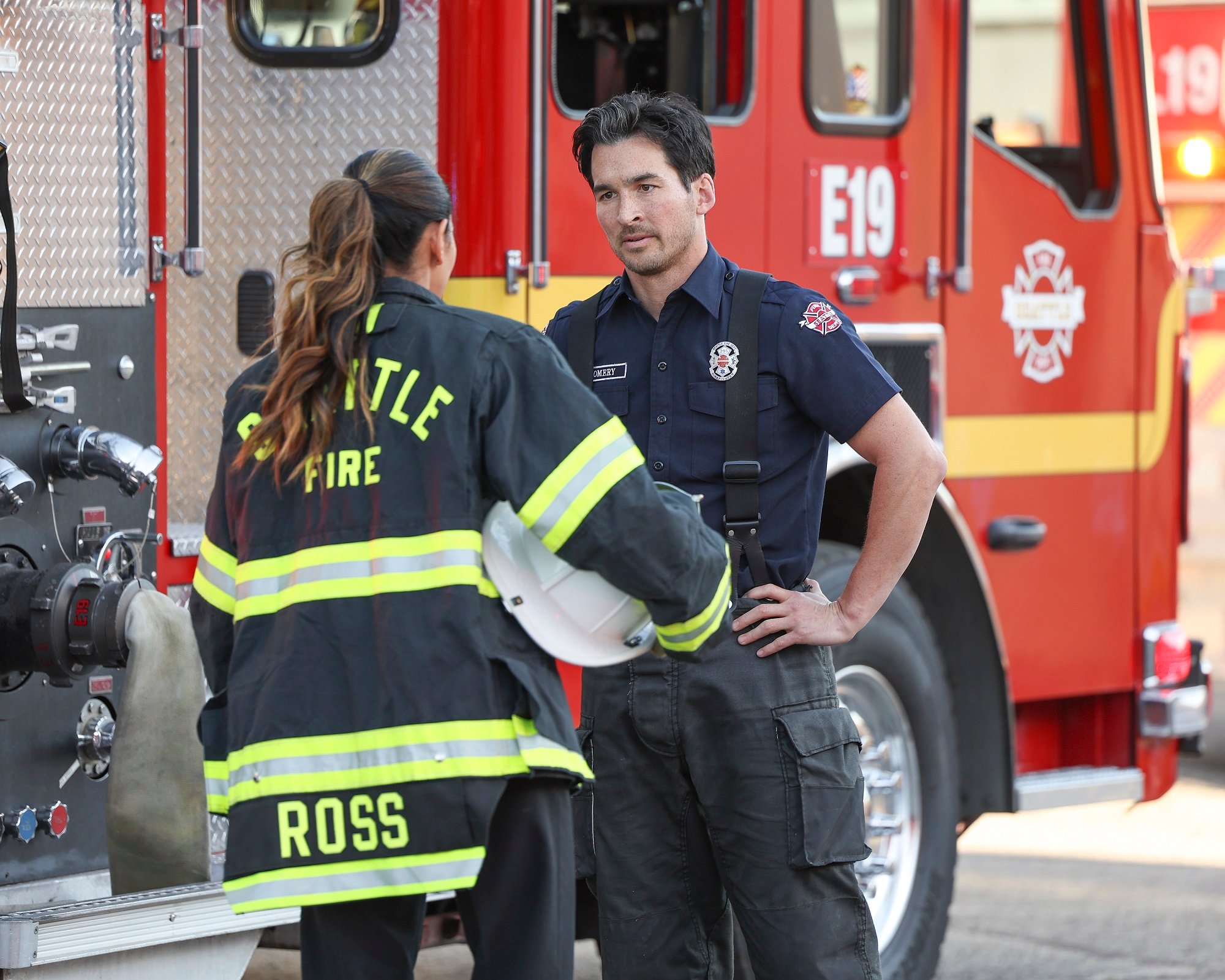 'Station 19' Season 5 Jay Hayden as Travis Montgomery, talks to Merle Dandridge as Natasha Ross