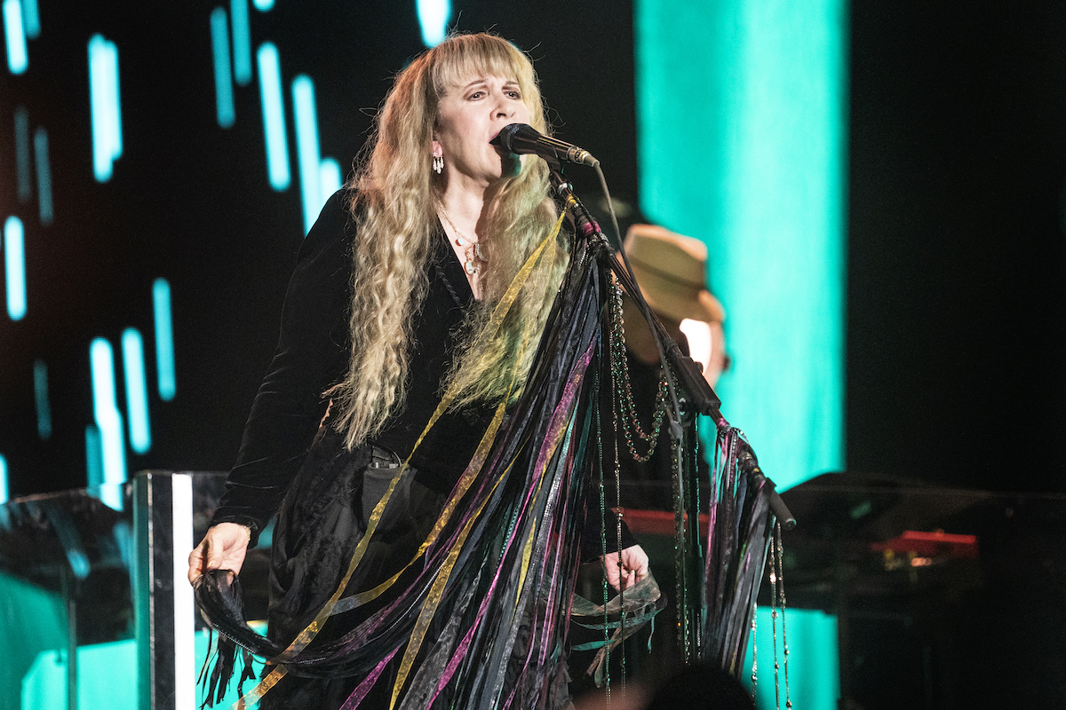 Stevie Nicks, who once said she would give Christine McVie $5 million to return to Fleetwood Mac, performing on stage.