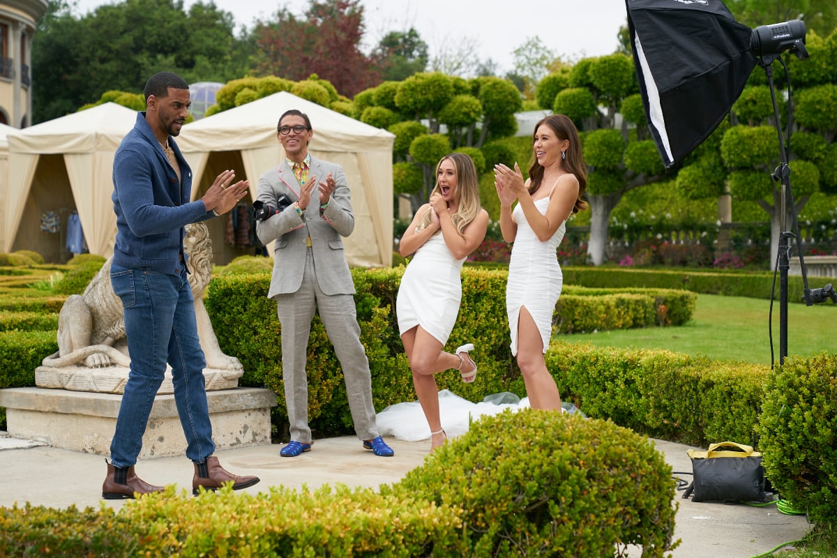 Michael Vaughan, Franco Lacosta, Gabby Windey, and Rachel Recchia during week 3 of The Bachelorette. Rachel and Gabby wear white dresses and prepare for a photo shoot.