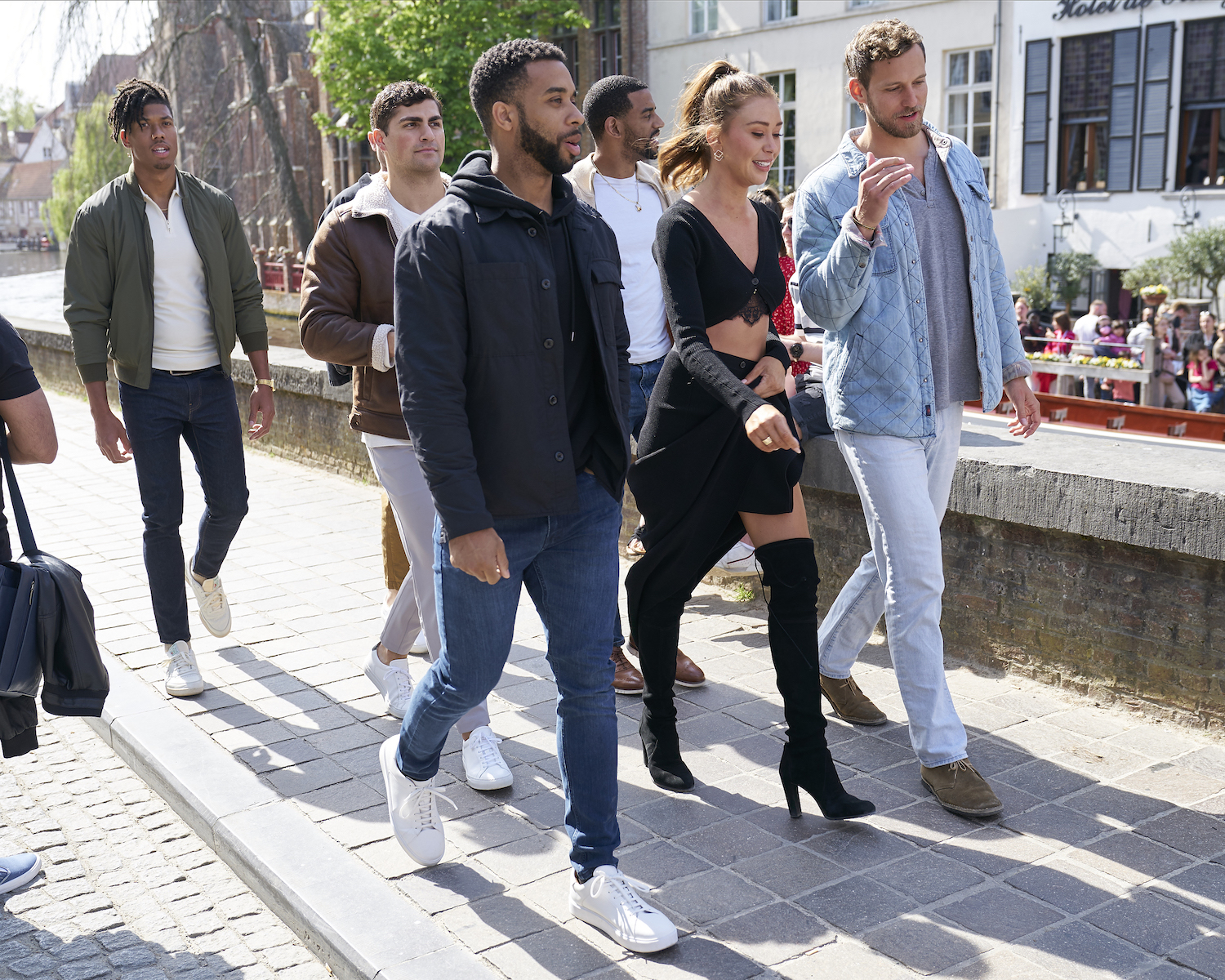 Gabby Windey walking with her men in 'The Bachelorette' Season 19. A few of the men make it to 'The Bachelorette' hometowns.