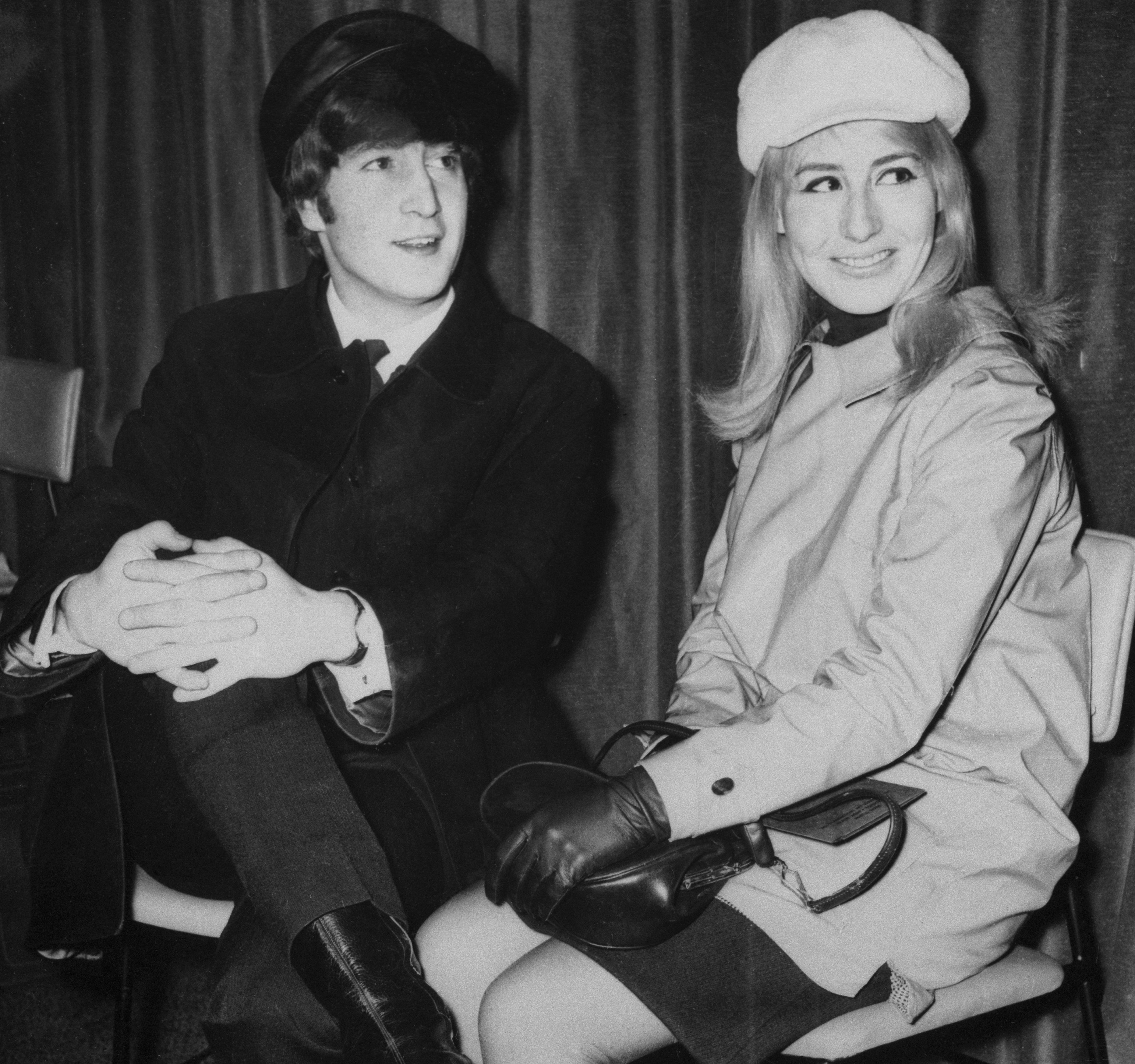 John Lennon and Cynthia Lennon sitting on chairs