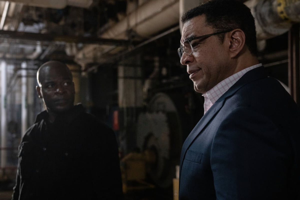 The Blacklist will return for season 10. Dembe Zuma looks at Harold Cooper. 