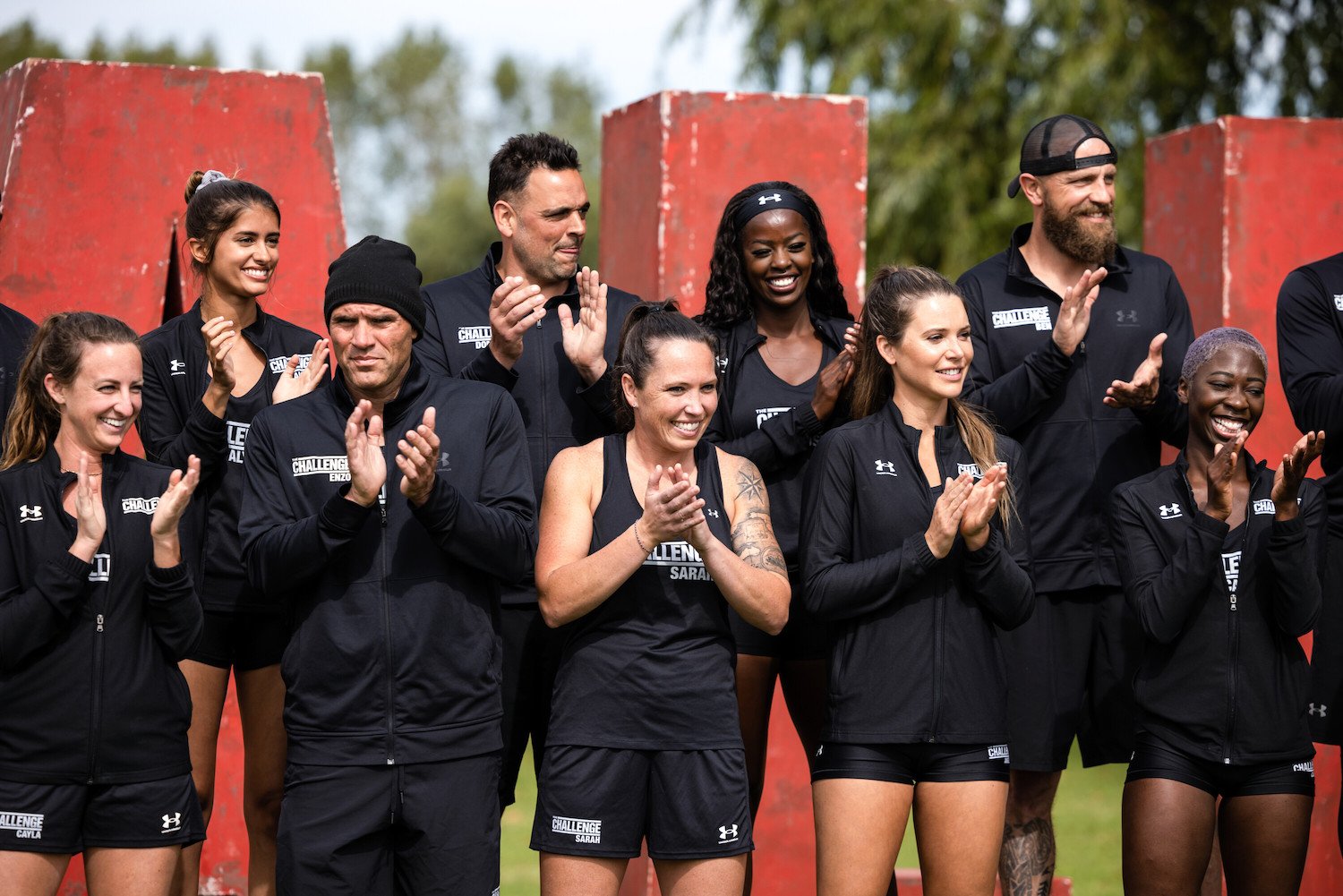 'The Challenge: USA' cast standing together and clapping in episode 8