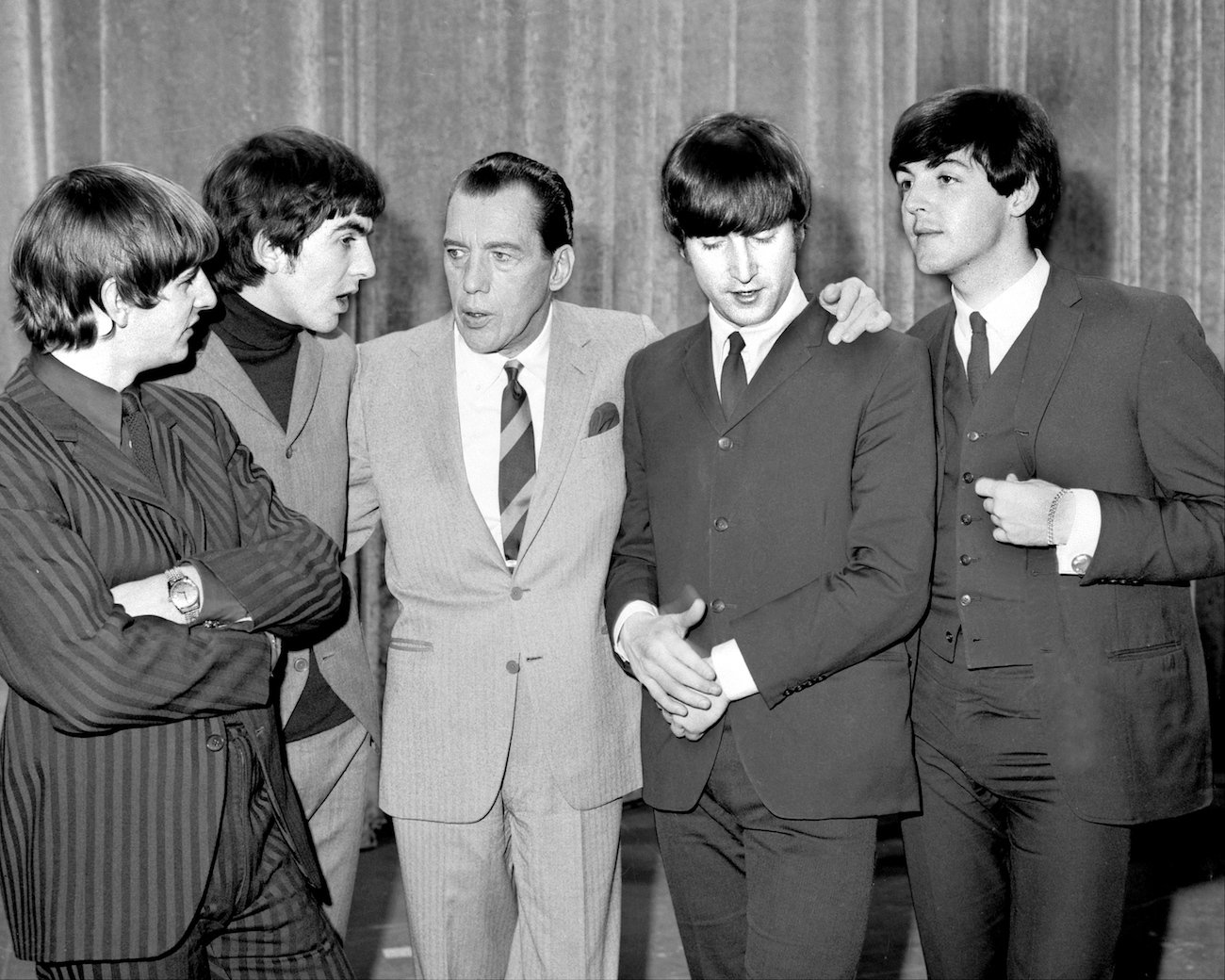 The Beatles with Ed Sullivan in 1964.