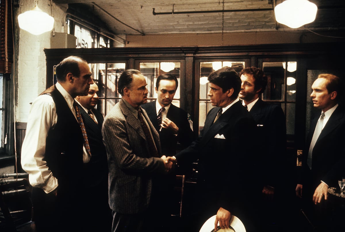 'The Godfather' scene showing Abe Vigoda and Robert Duvall watch Marlon Brando and Al Lettieri shake hands