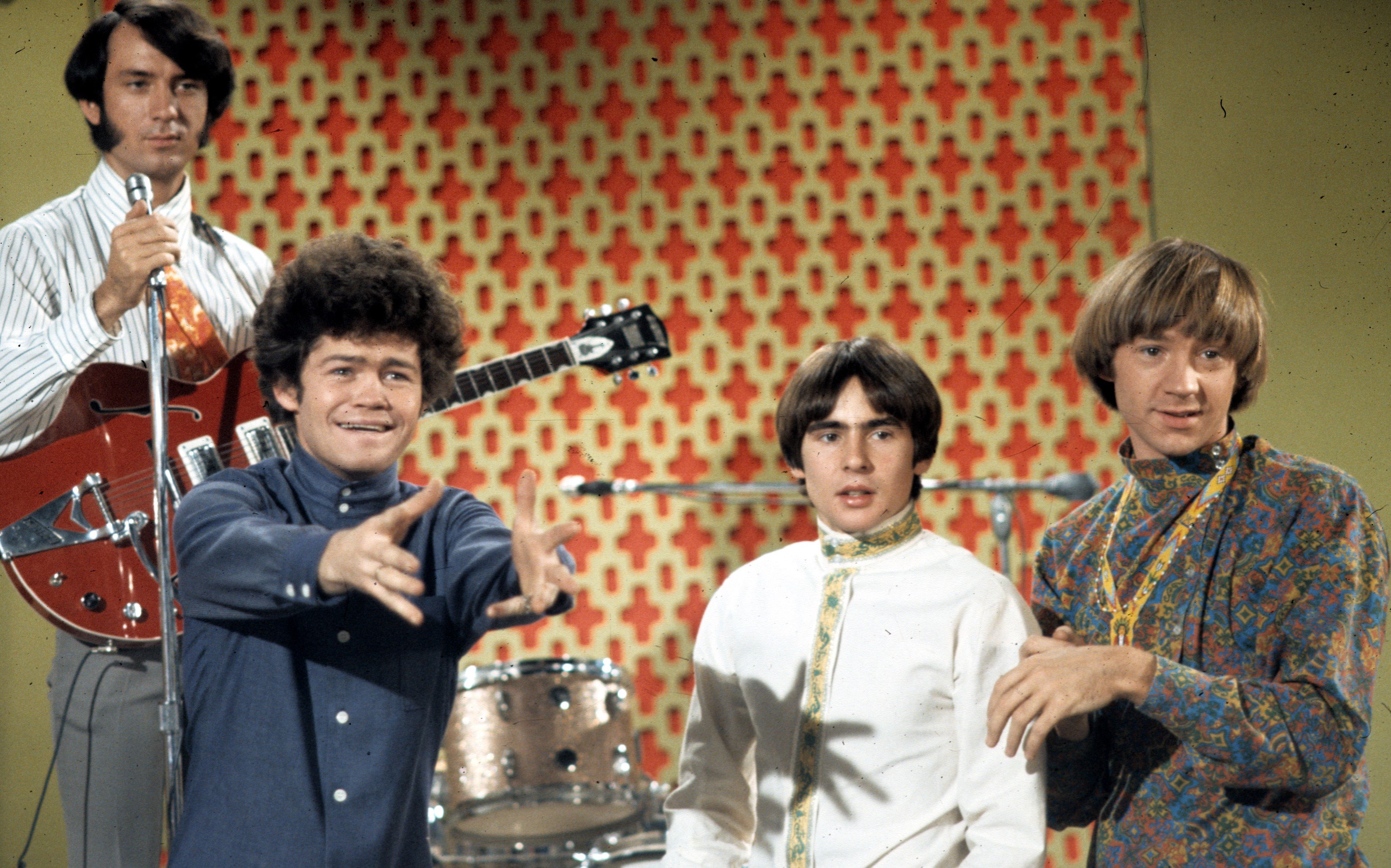 Mike Nesmith, Micky Dolenz, Davy Jones, and Peter Tork standing during The Monkees' "Words" era