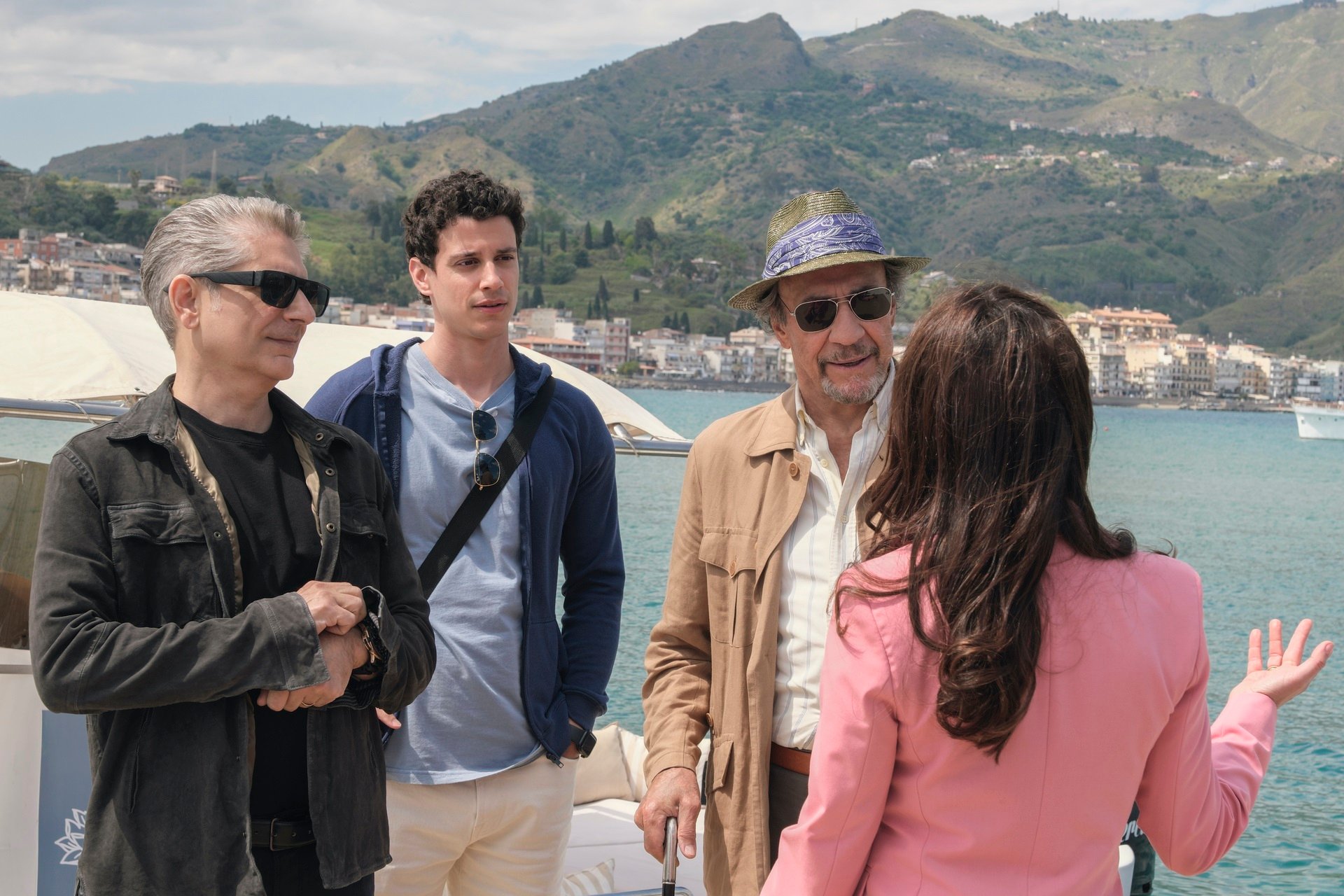 'The White Lotus: Sicily' Season 2 cast members Michael Imperioli, Adam DiMarco, and F. Murray Abraham talking to the resort manager