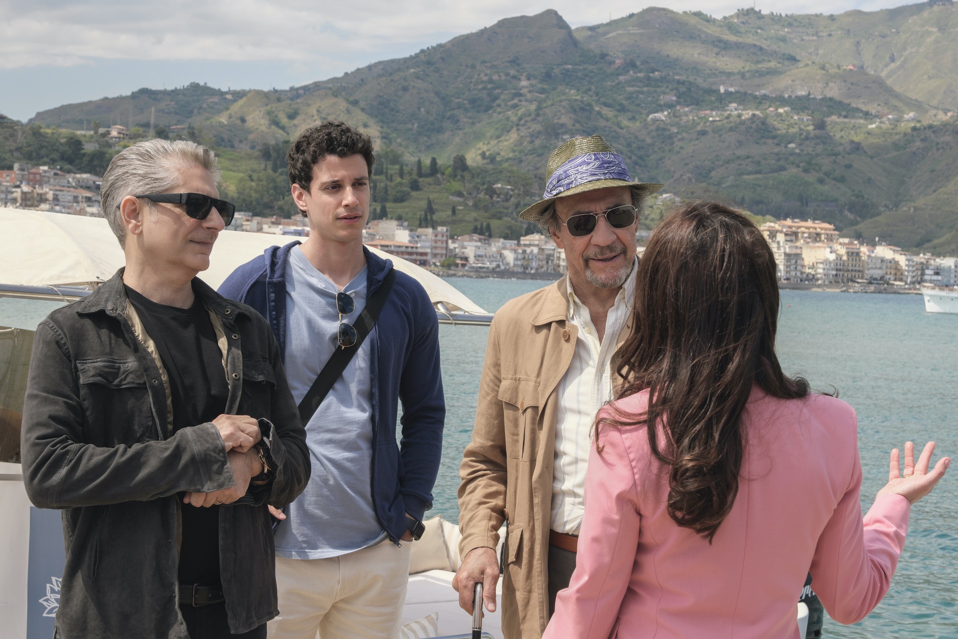 'The White Lotus: Sicily' Season 2: Michael Imperioli, Adam DiMarco, and F. Murray Abraham speaking to resort manager Valentina