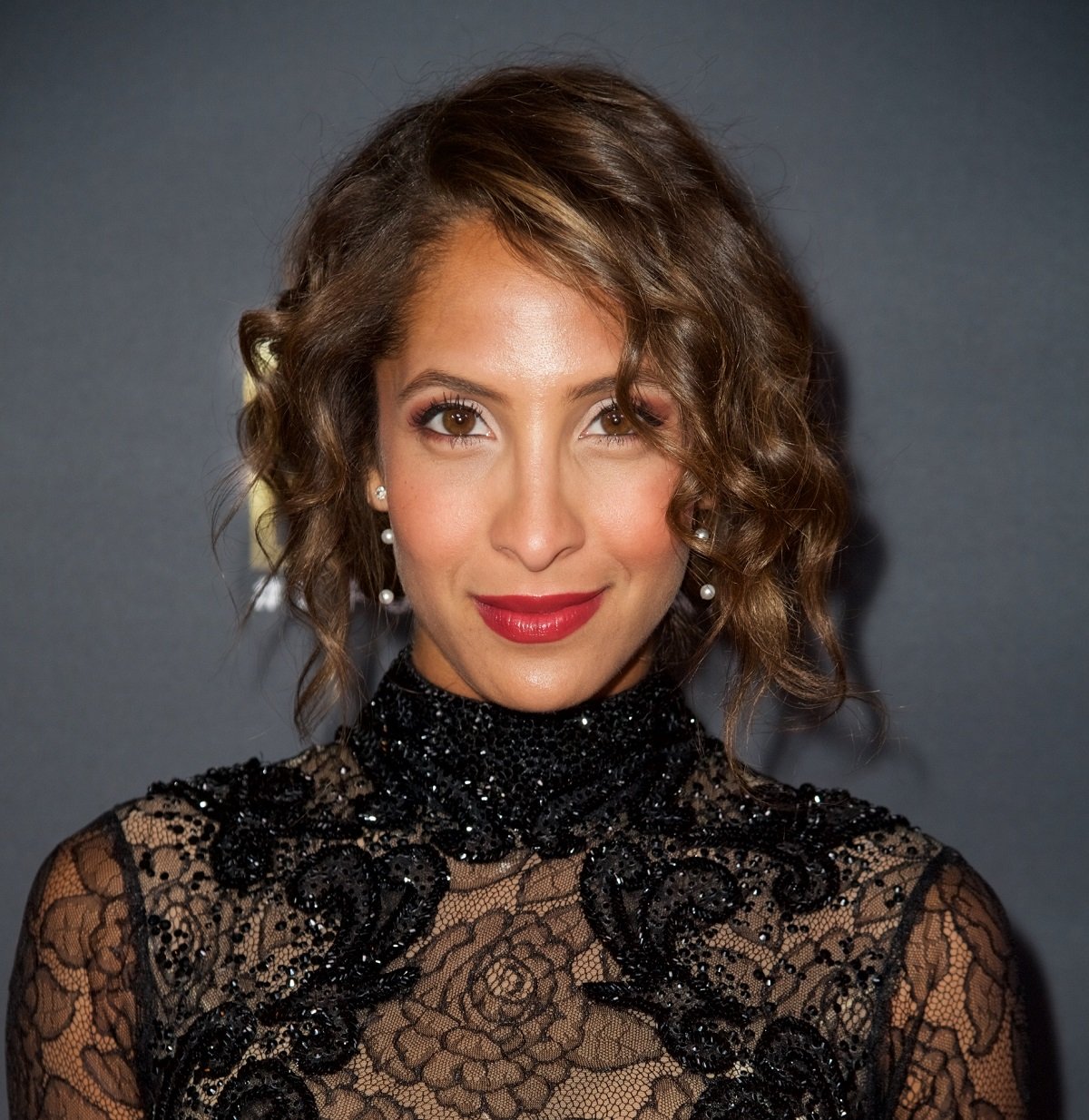 'The Young and the Restless' star Christel Khalil wearing a black dress during a red carpet appearance.