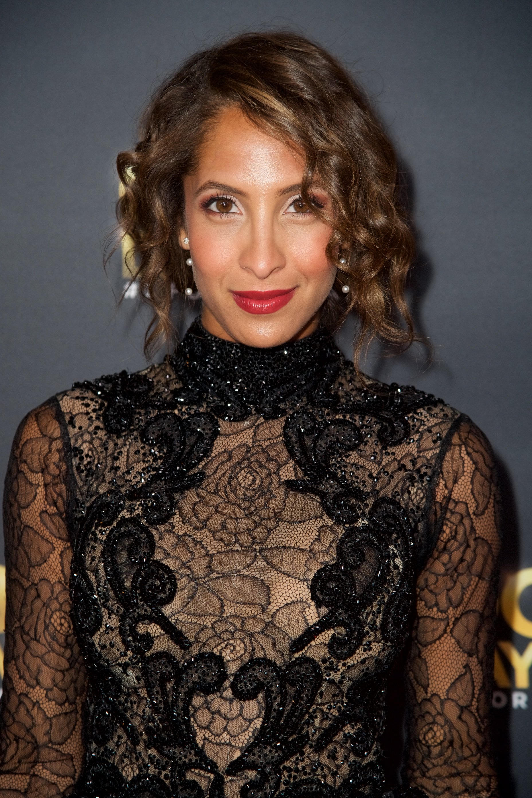 'The Young and the Restless' star Christel Khalil wearing a black dress during a red carpet appearance.