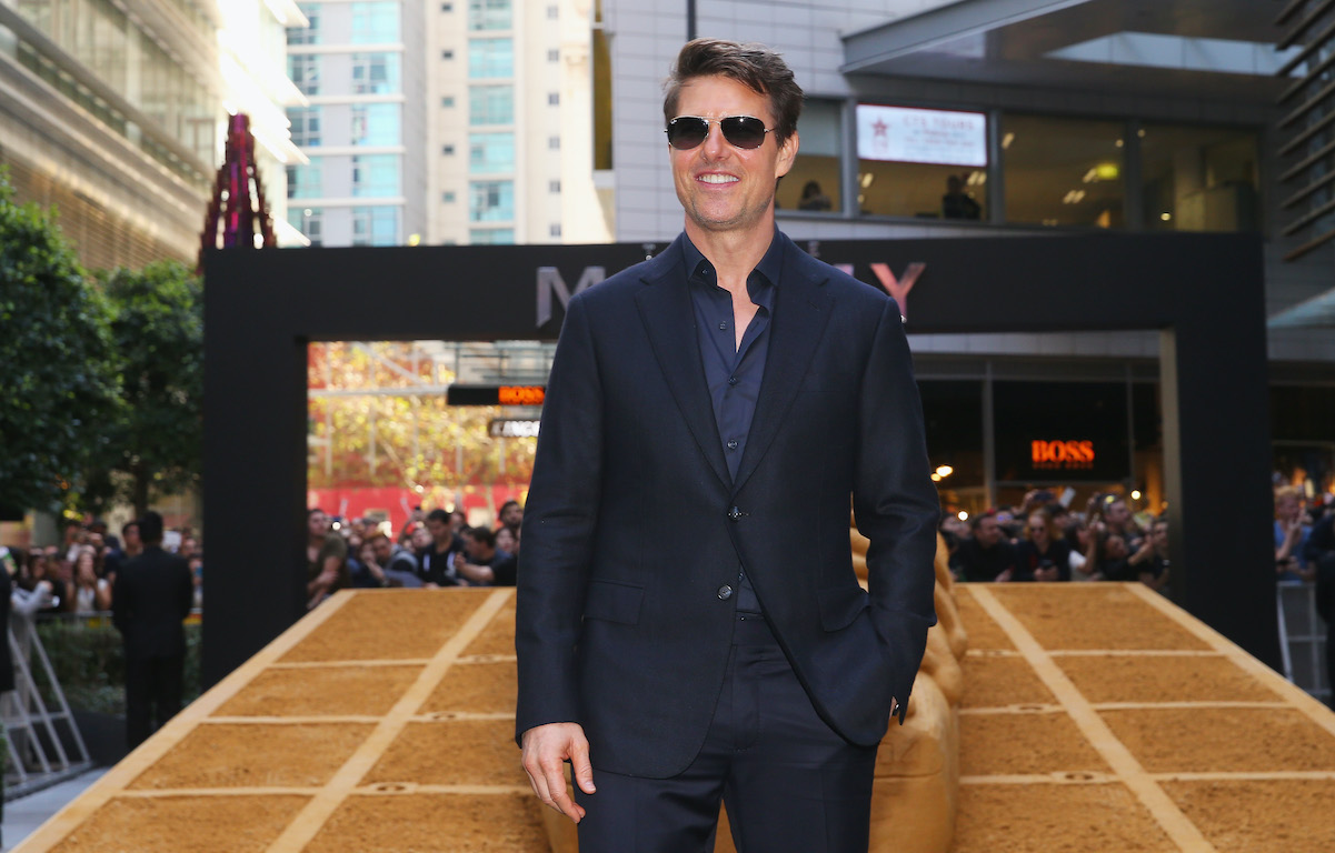 Tom Cruise, who has a high net worth, looks toward the crowd at an event in Australia in 2017