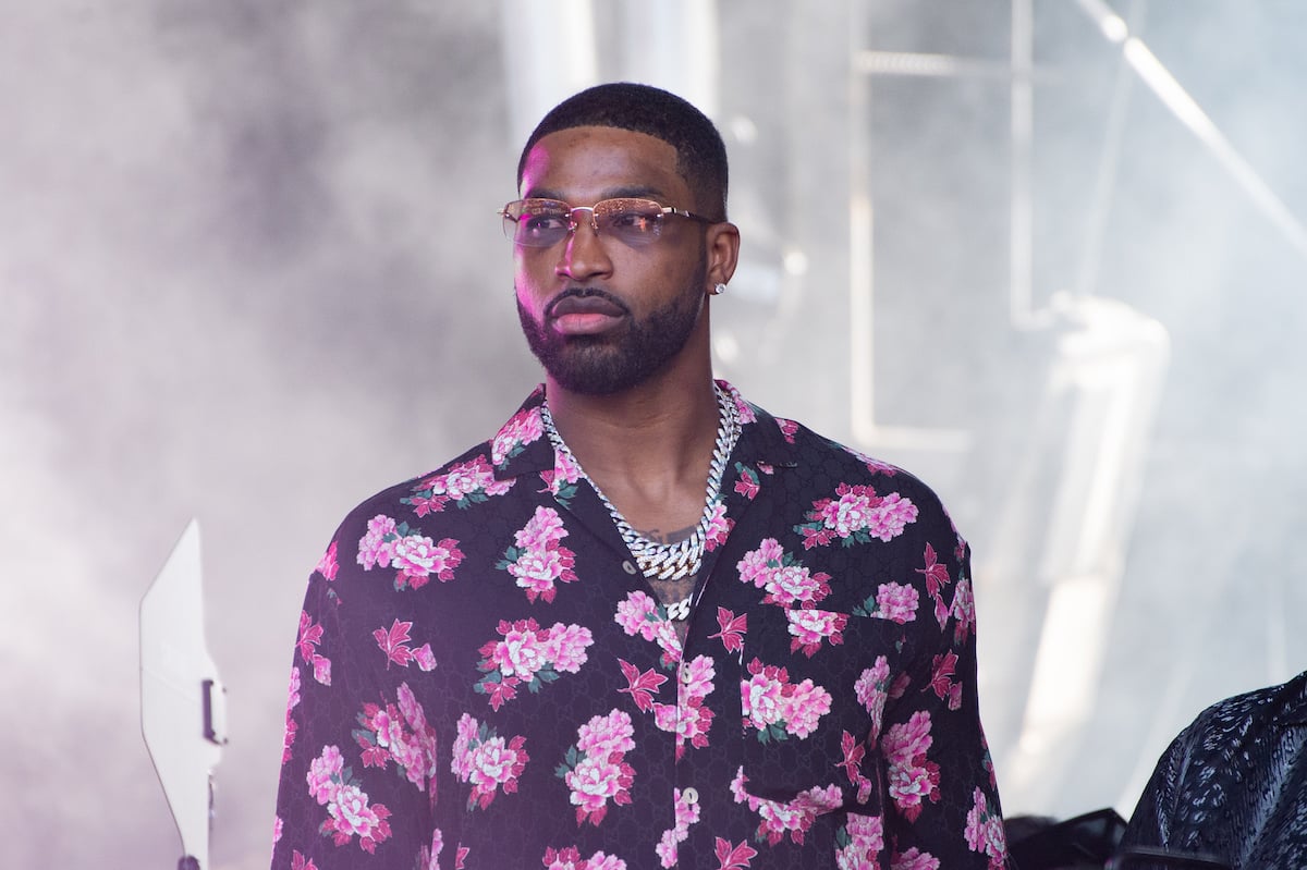 Tristan Thompson watching a concert from the side of the stage