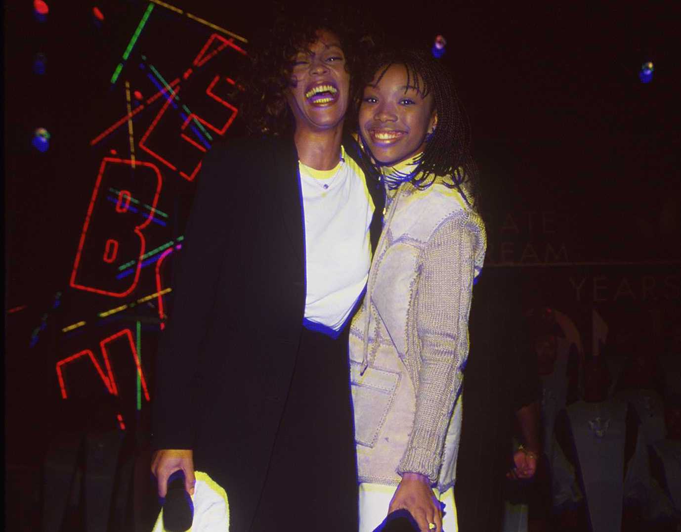Whitney Houston and Brandy pose for photo; Brandy says the best part of filming 'Cinderella' was being in the recording studio with Houston