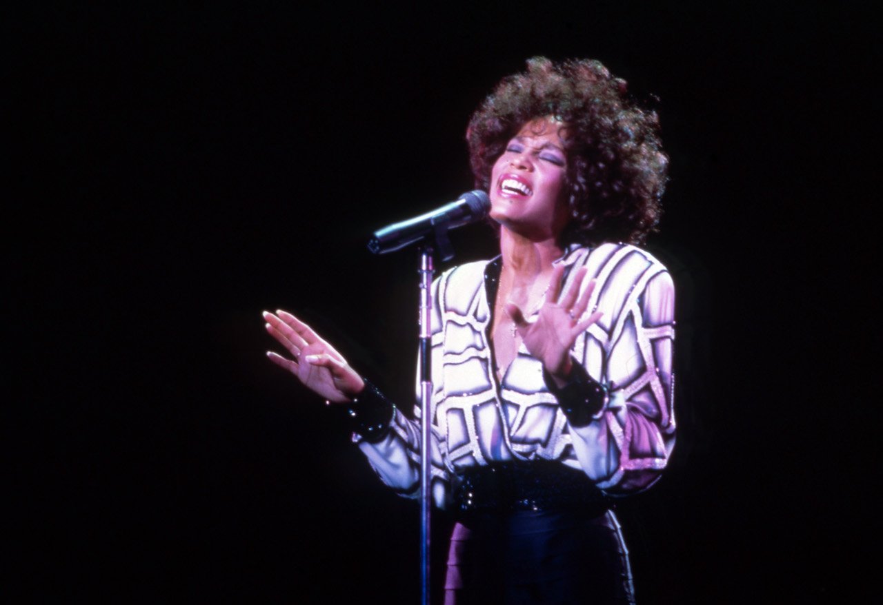 Whitney Houston performs live on stage; one of Houston's cousins is an iconic opera singer
