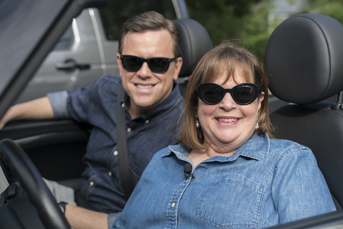 Willie Geist and Ina Garten, who has summer recipes in 'Modern Comfort Food,' smile as they sit in a car