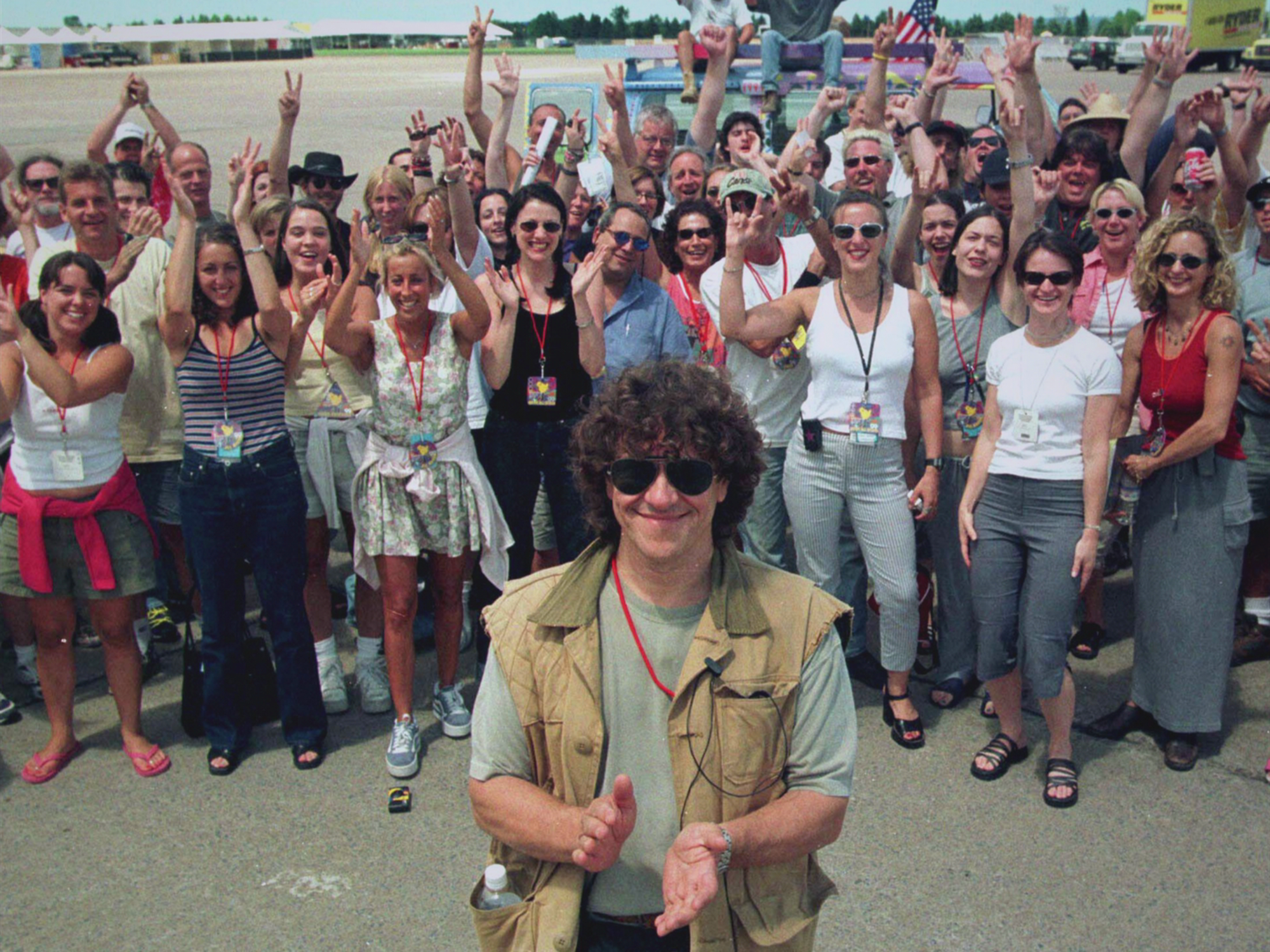'Trainwreck: Woodstock '99' features Michael Lang, seen here standing in front of a crowd of people.