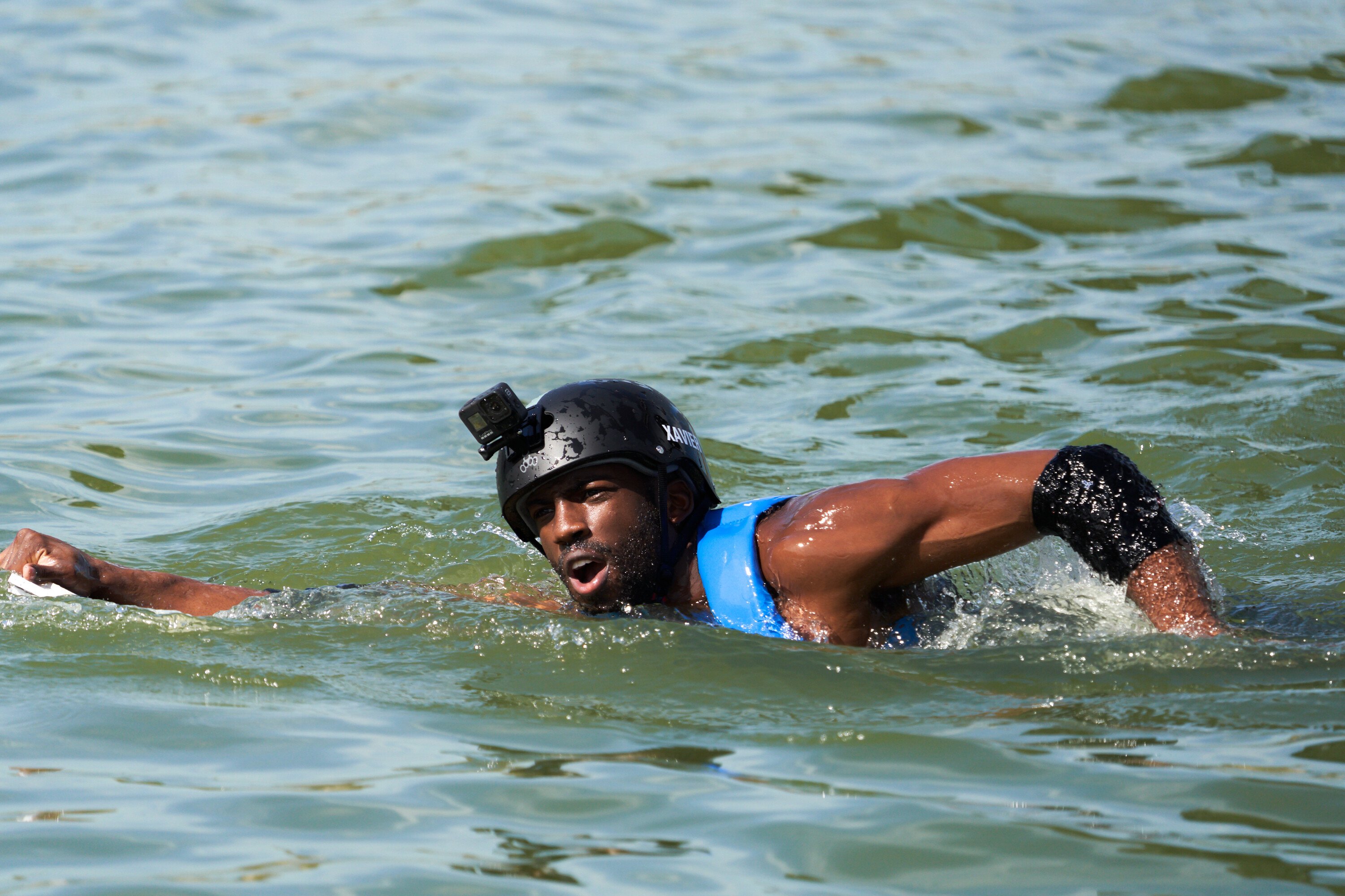 Xavier Prather swimming during a daily mission in 'The Challenge: USA'