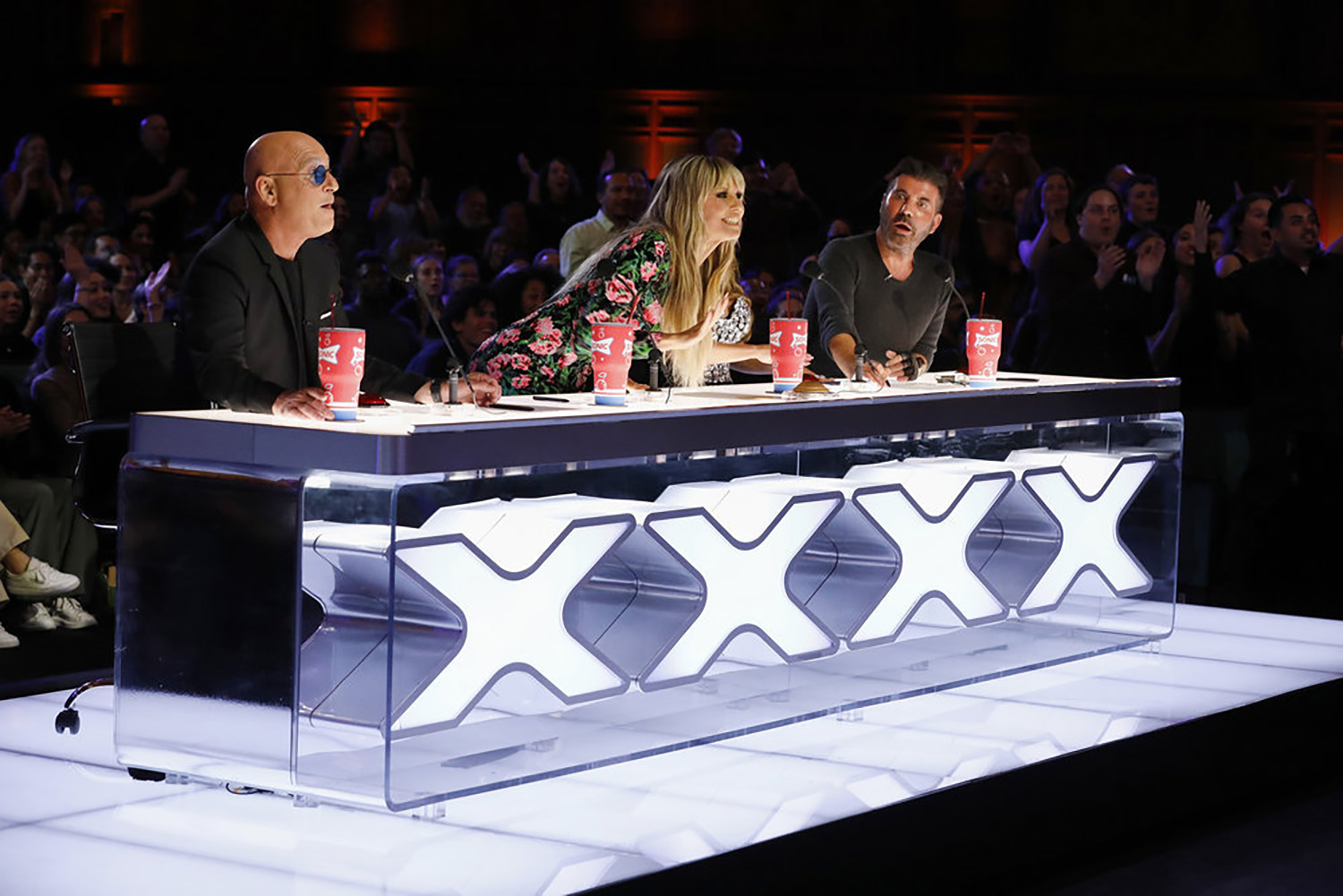 Americas Got Talent Season 17 judges Howie Mandel, Heidi Klum, and Simon Cowell ahead of the Wildcard Vote