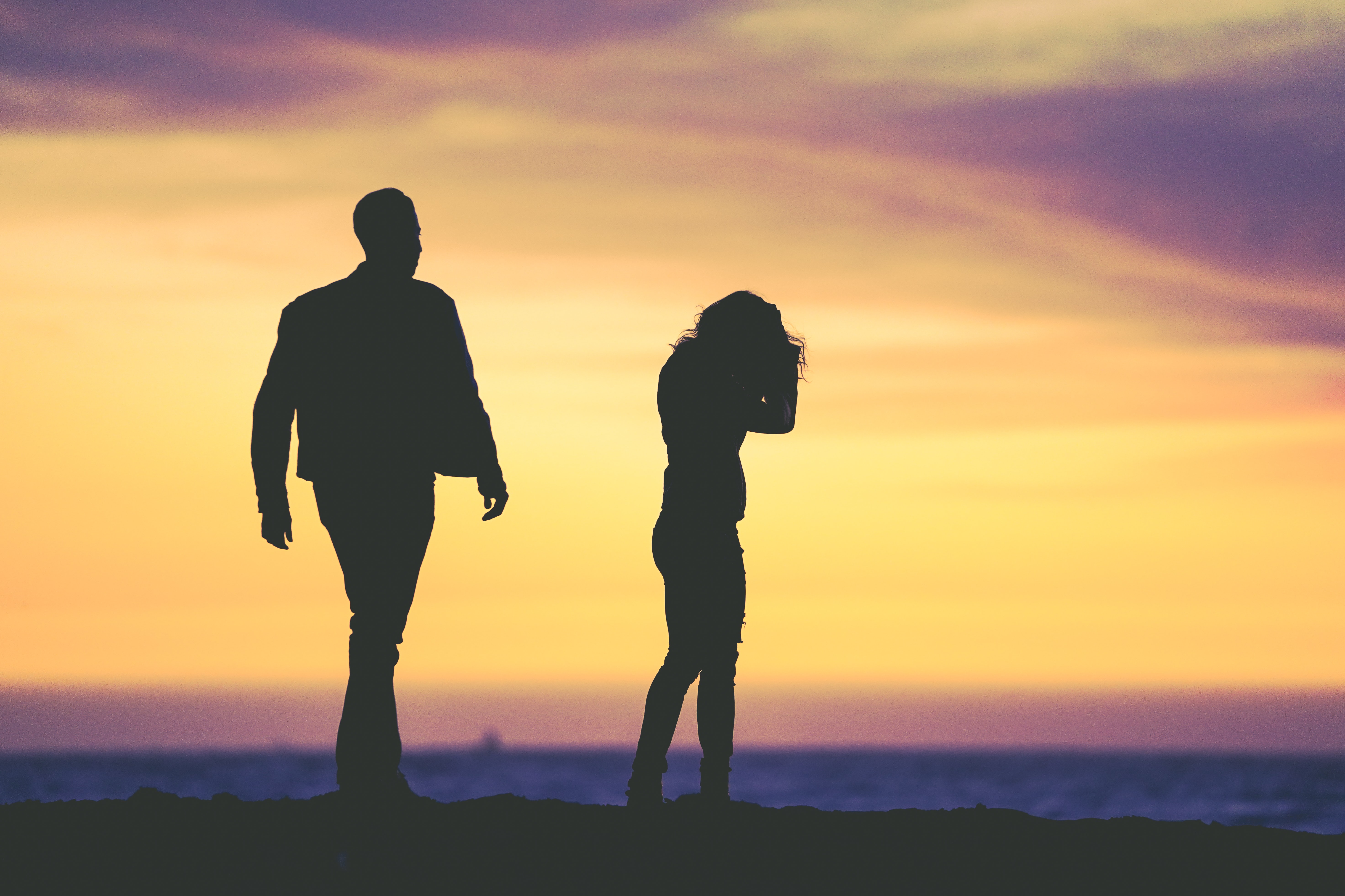 Couple arguing on the beach