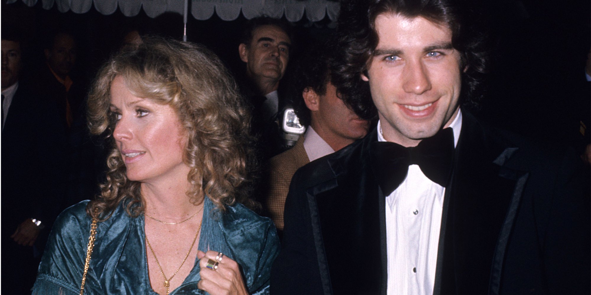 Diana Hyland and John Travolta pose together at a Hollywood event in 1976.