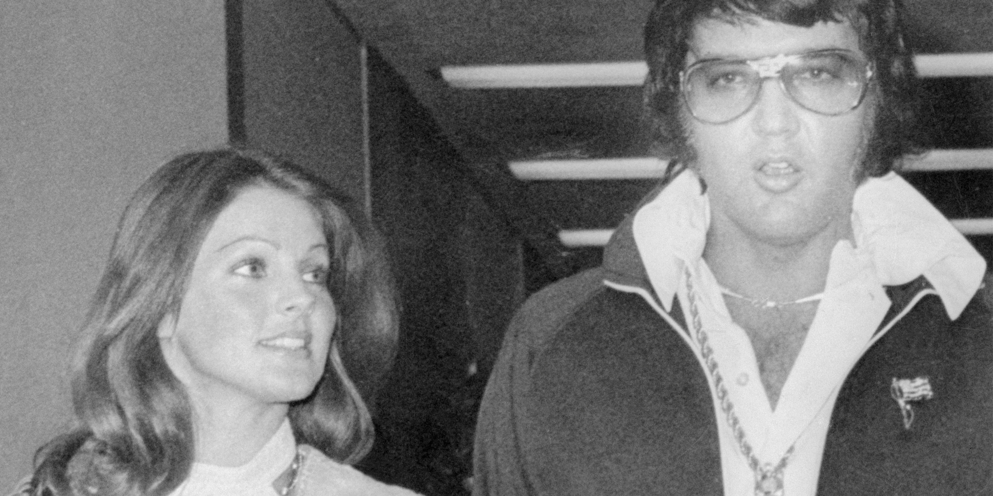 Priscilla and Elvis Presley walk out of a Santa Monica, CA courthouse after their 1973 divorce.