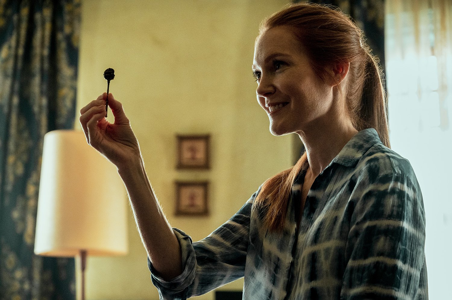 Darby Stanchfield as Nina Locke holding the Head Key in Locke & Key Season 3 on Netflix