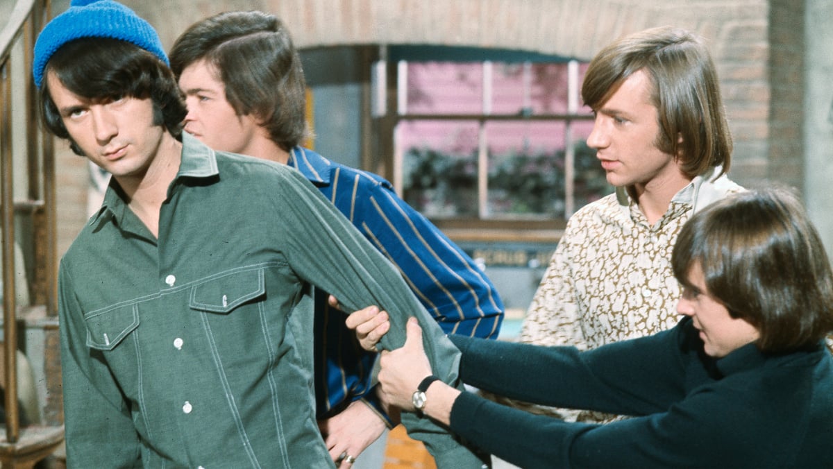 The Monkees cast includes Davy Jones, Mike Nesmith, Mickey Dolenz, and Peter Tork.