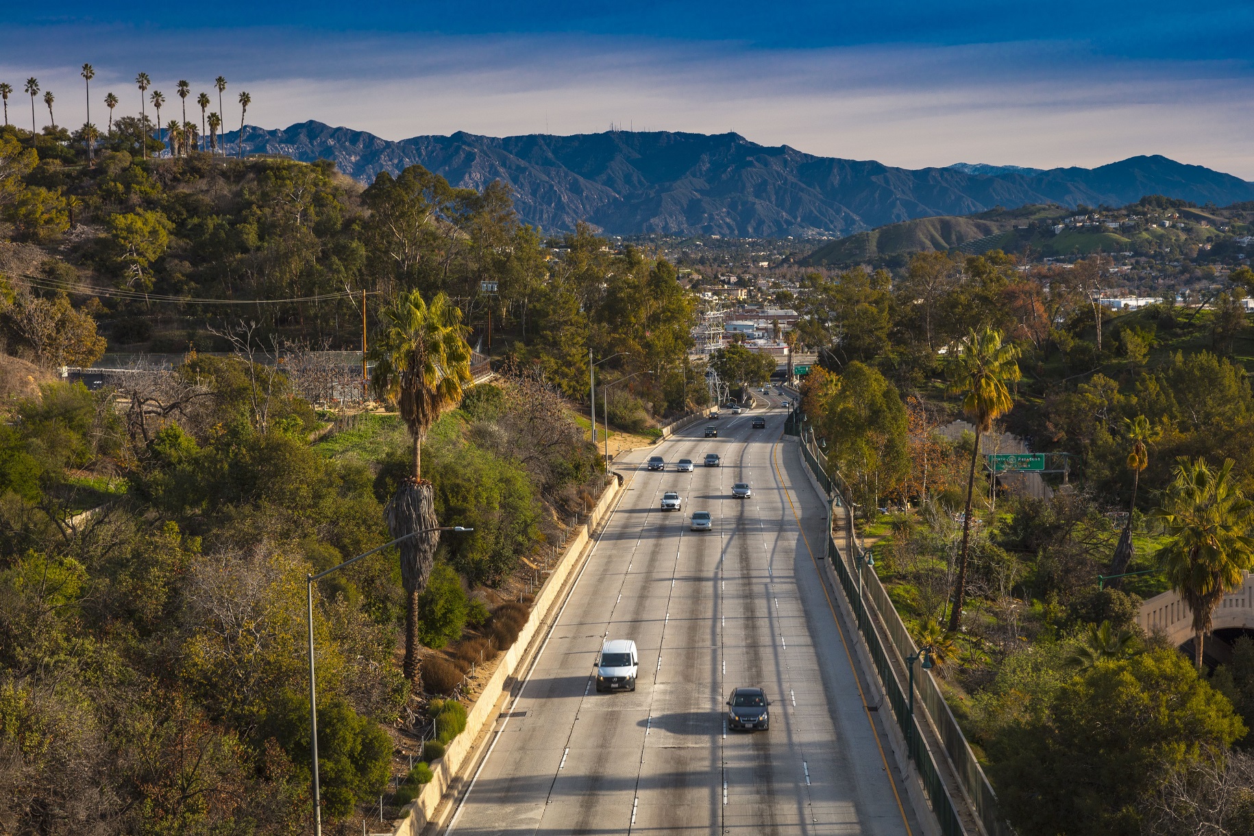 Pasadena Freeway, Arroyo Seco Parkway, CA 110 leads to downtown Los Angeles in morning light.