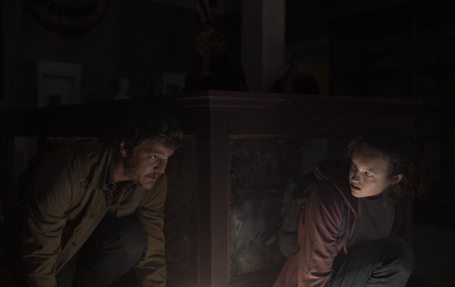 Pedro Pascal as Joel Miller and Bella Ramsey as Ellie in HBO Max's The Last of Us