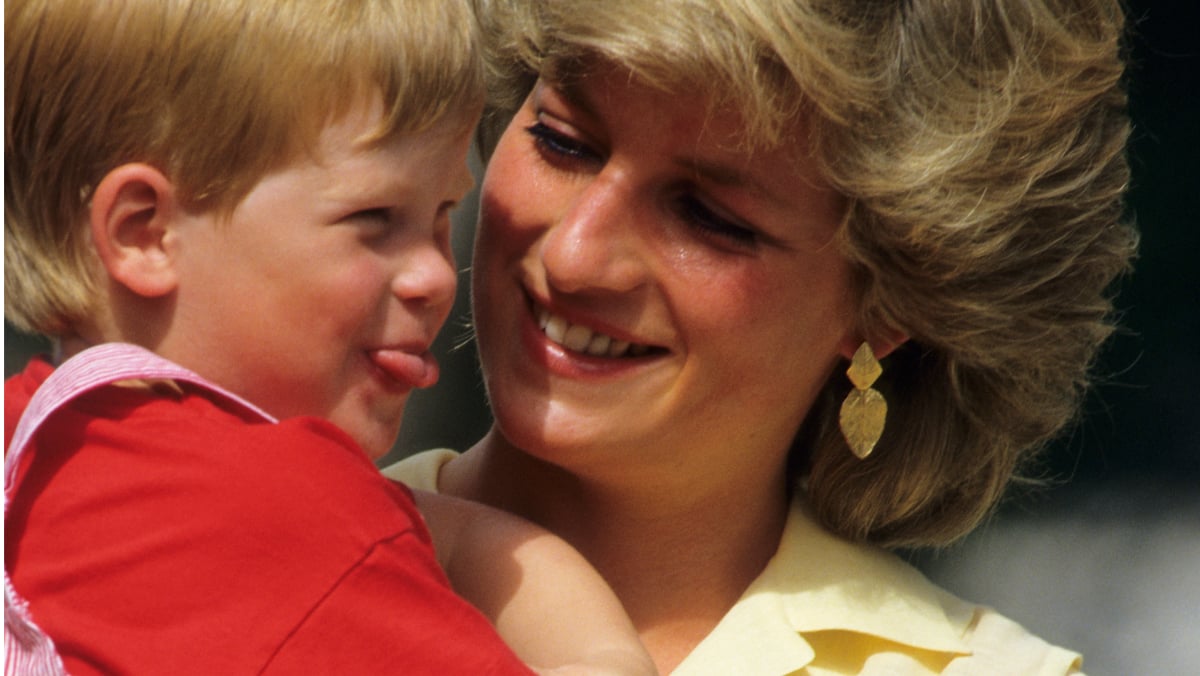 Prince Harry and Princess Diana photographed on holiday in Majorca, Spain on August 10, 1987.