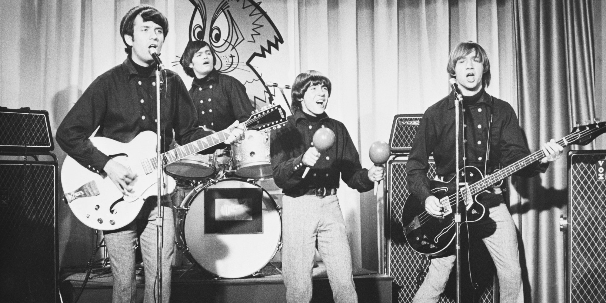 The Monkees on the set of their television show. The cast included Mike Nesmith, Micky Dolenz, Peter Tork, and Davy Jones.