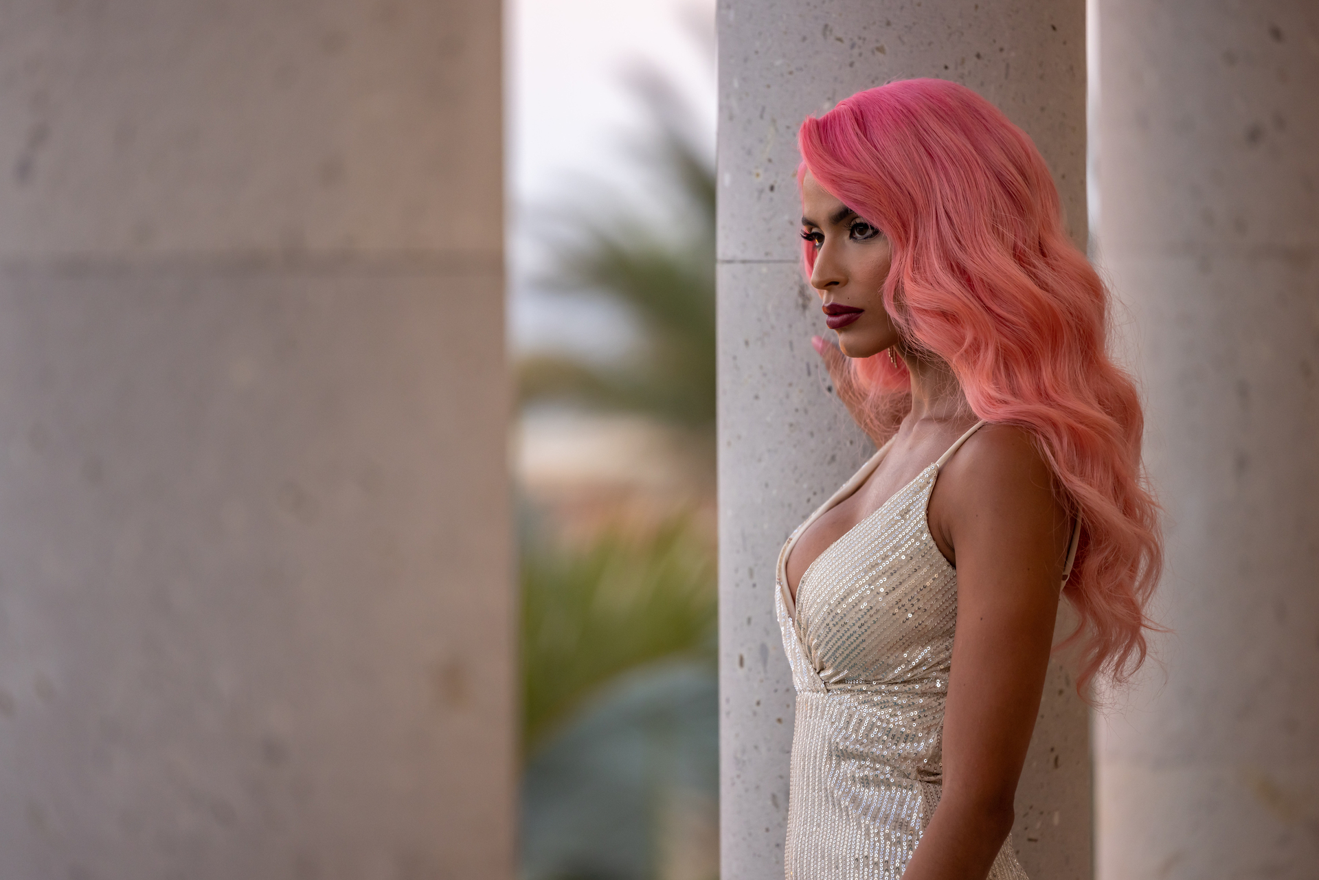 'FBoy Island' Season 2 star Tamaris Sepulveda standing next to a large column in a formal gown. Who did Tamaris choose in the finale?