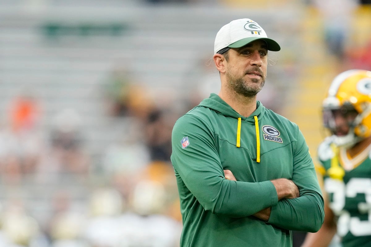 Aaron Rodgers, who's older than his girlfriend Blu of Earth, looks on before a preseason game