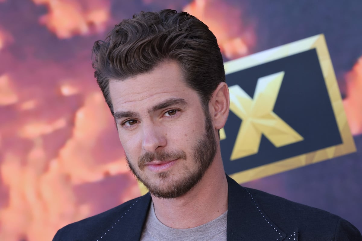 Andrew Garfield in front of a blurred background