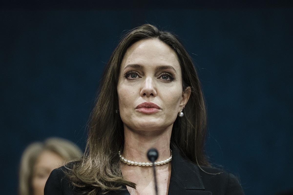 Angelina Jolie speaking at a News Conference.