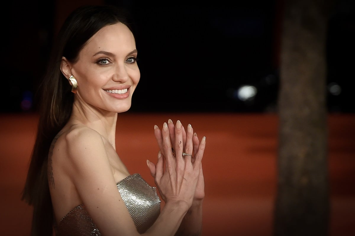 Angelina Jolie smiling at the 'Eternals' premiere.